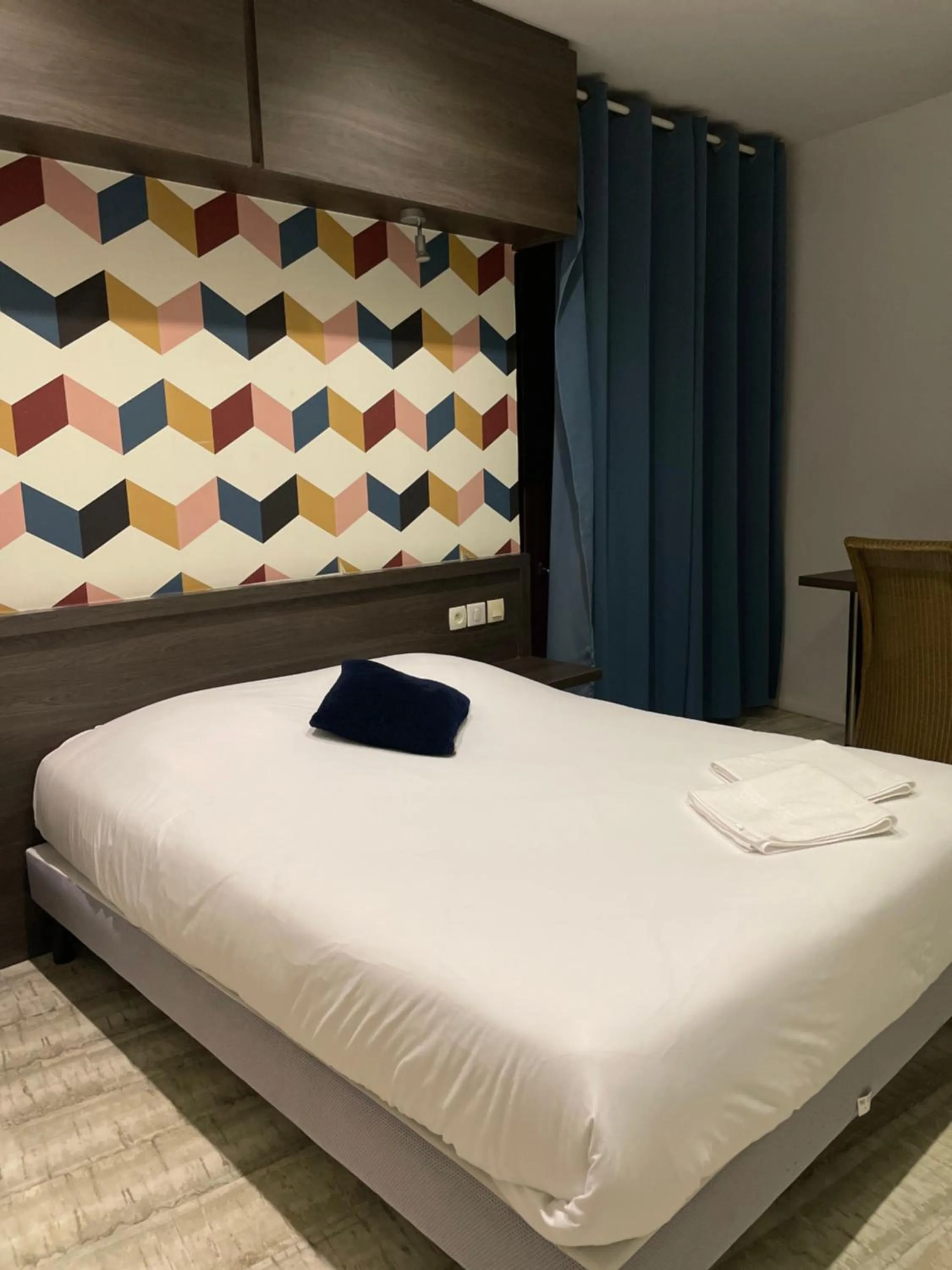 Bed in Théâtre Hôtel Chambéry