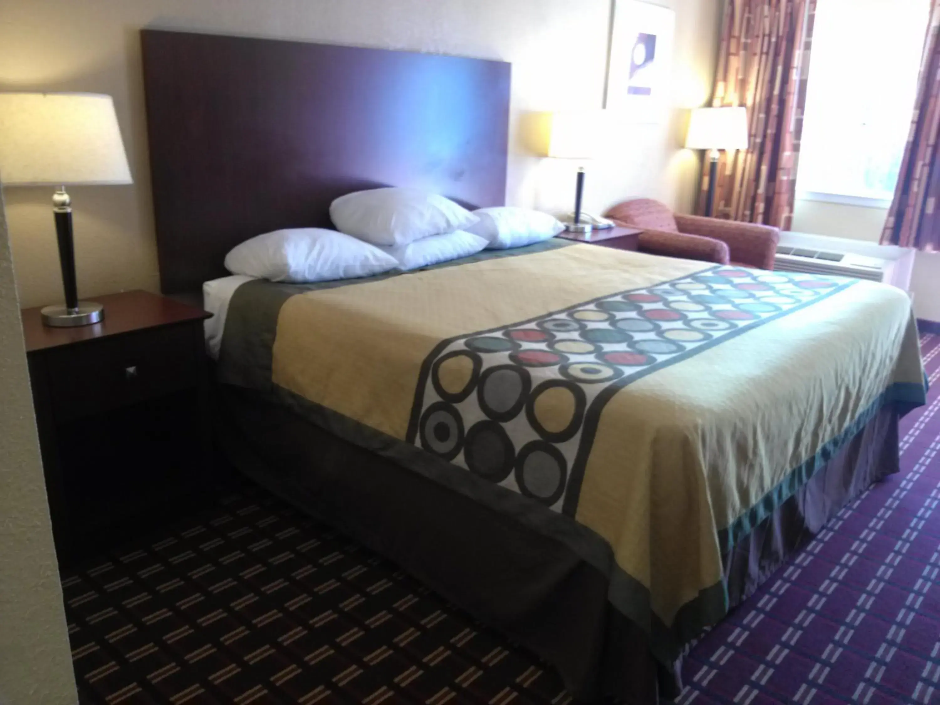 Living room, Bed in Super 8 by Wyndham Kerrville TX Living room, Bed in Super 8 by Wyndham Kerrville TX