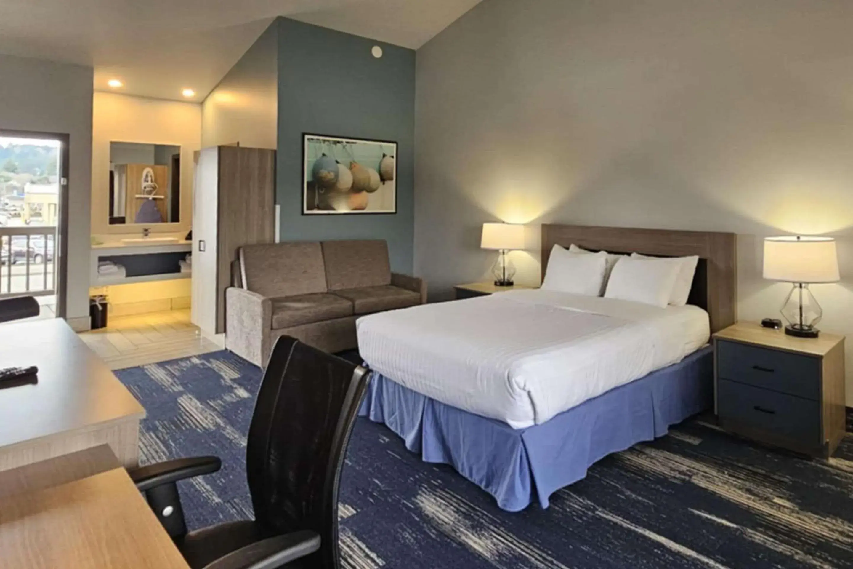 Bedroom, Bed in Edgewater Inn and Suites, an Ascend Collection Hotel Bedroom, Bed in Edgewater Inn and Suites, an Ascend Collection Hotel