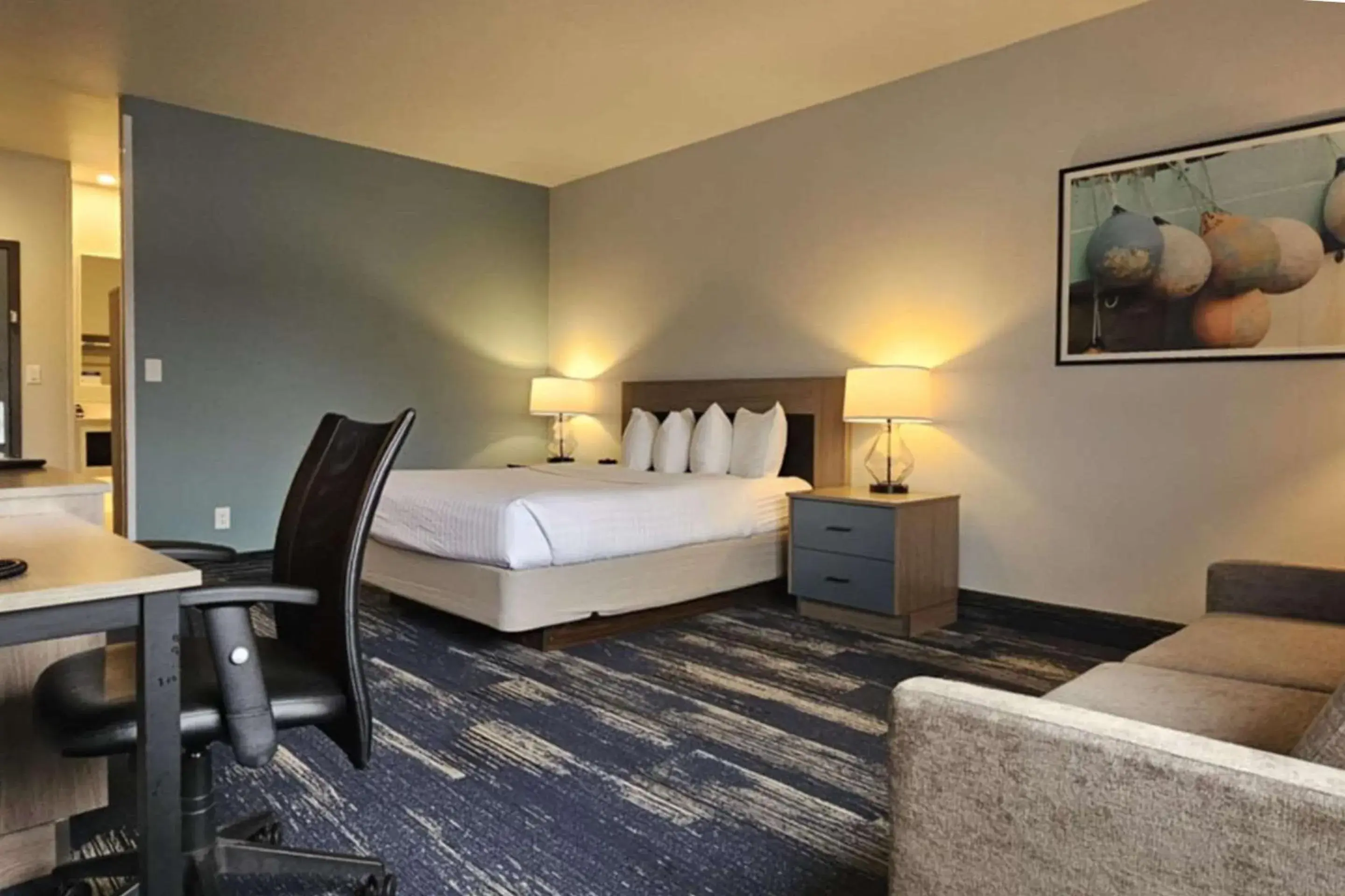 Bedroom, Bed in Edgewater Inn and Suites, an Ascend Collection Hotel Bedroom, Bed in Edgewater Inn and Suites, an Ascend Collection Hotel