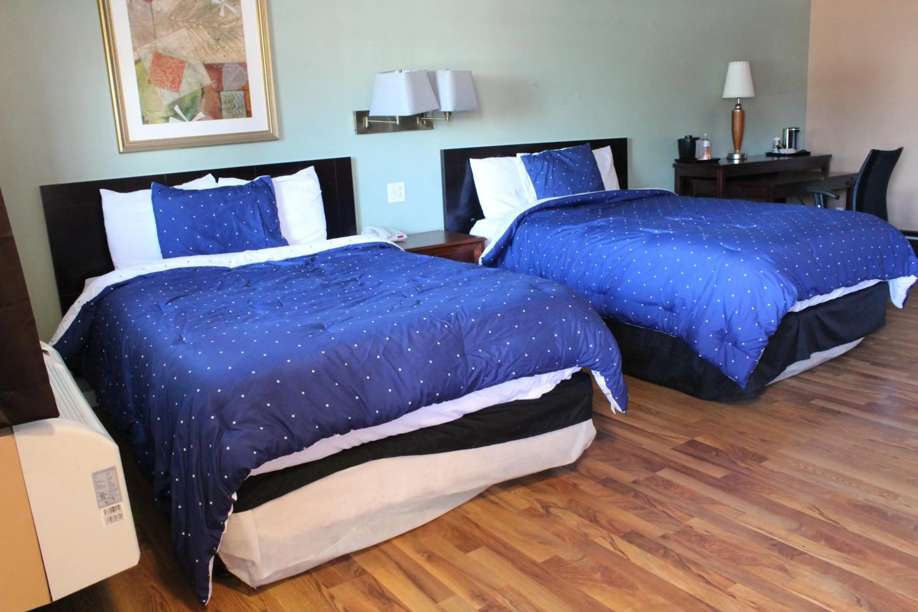 Bed in Bellevue Hotel and Suites