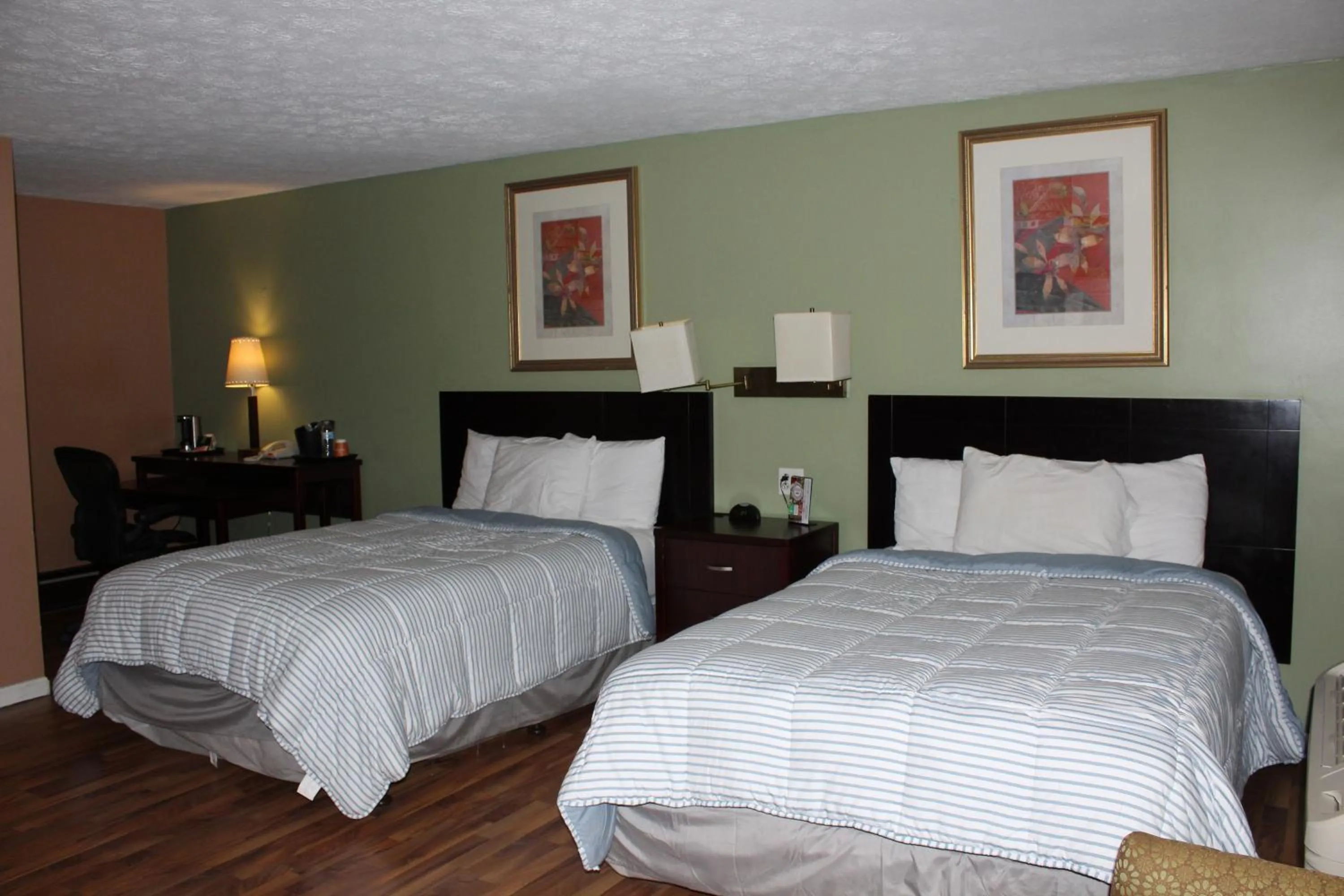 Bed in Bellevue Hotel and Suites