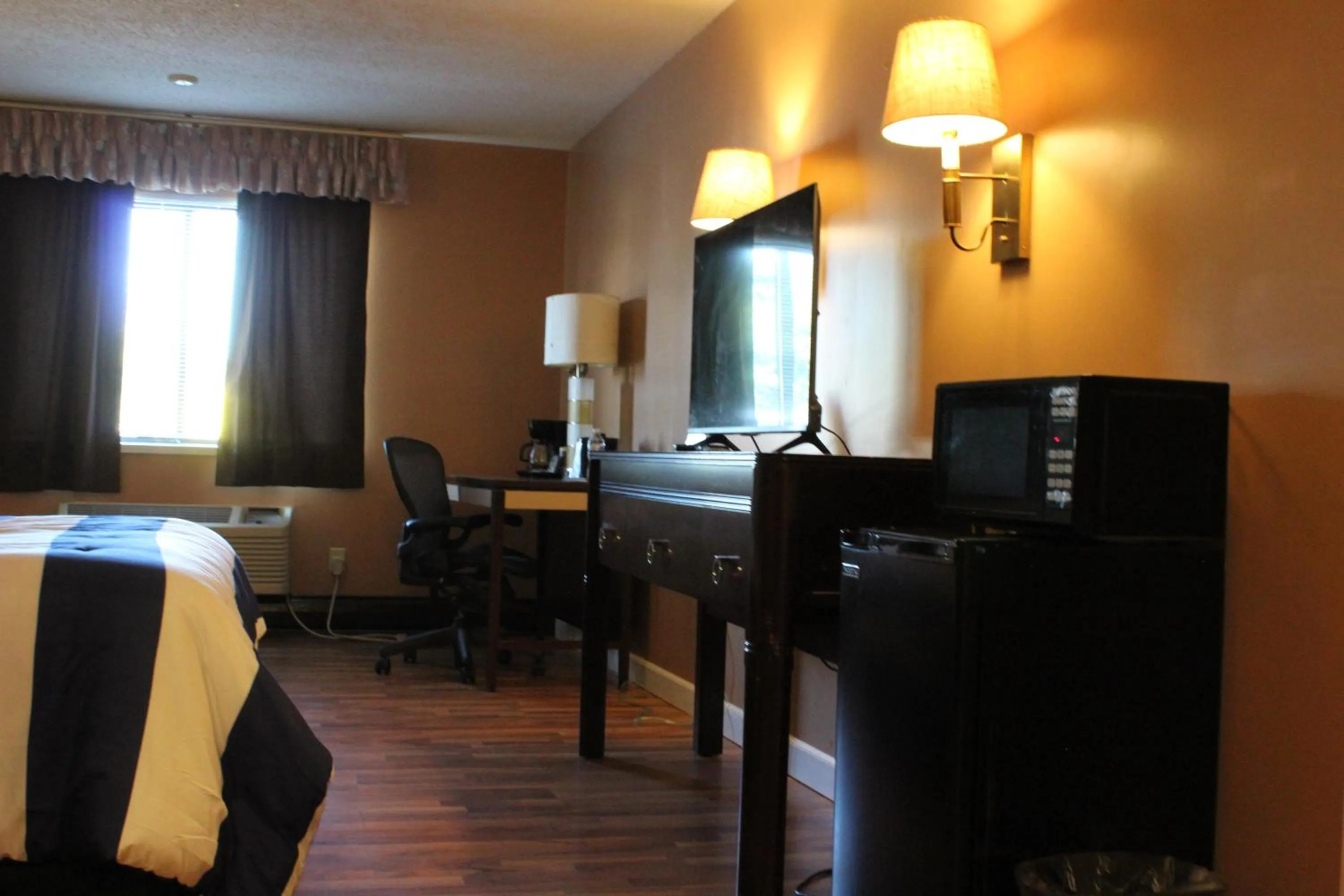 Bed in Bellevue Hotel and Suites