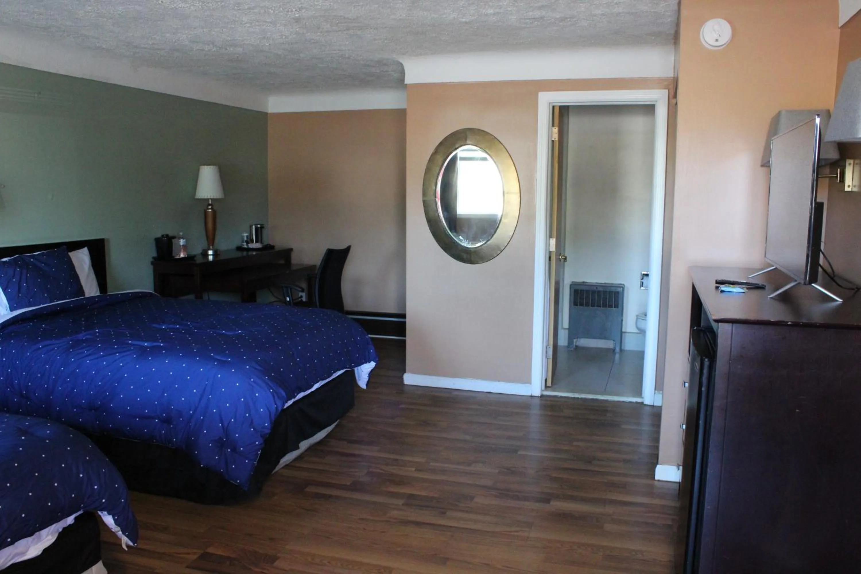 Bed in Bellevue Hotel and Suites