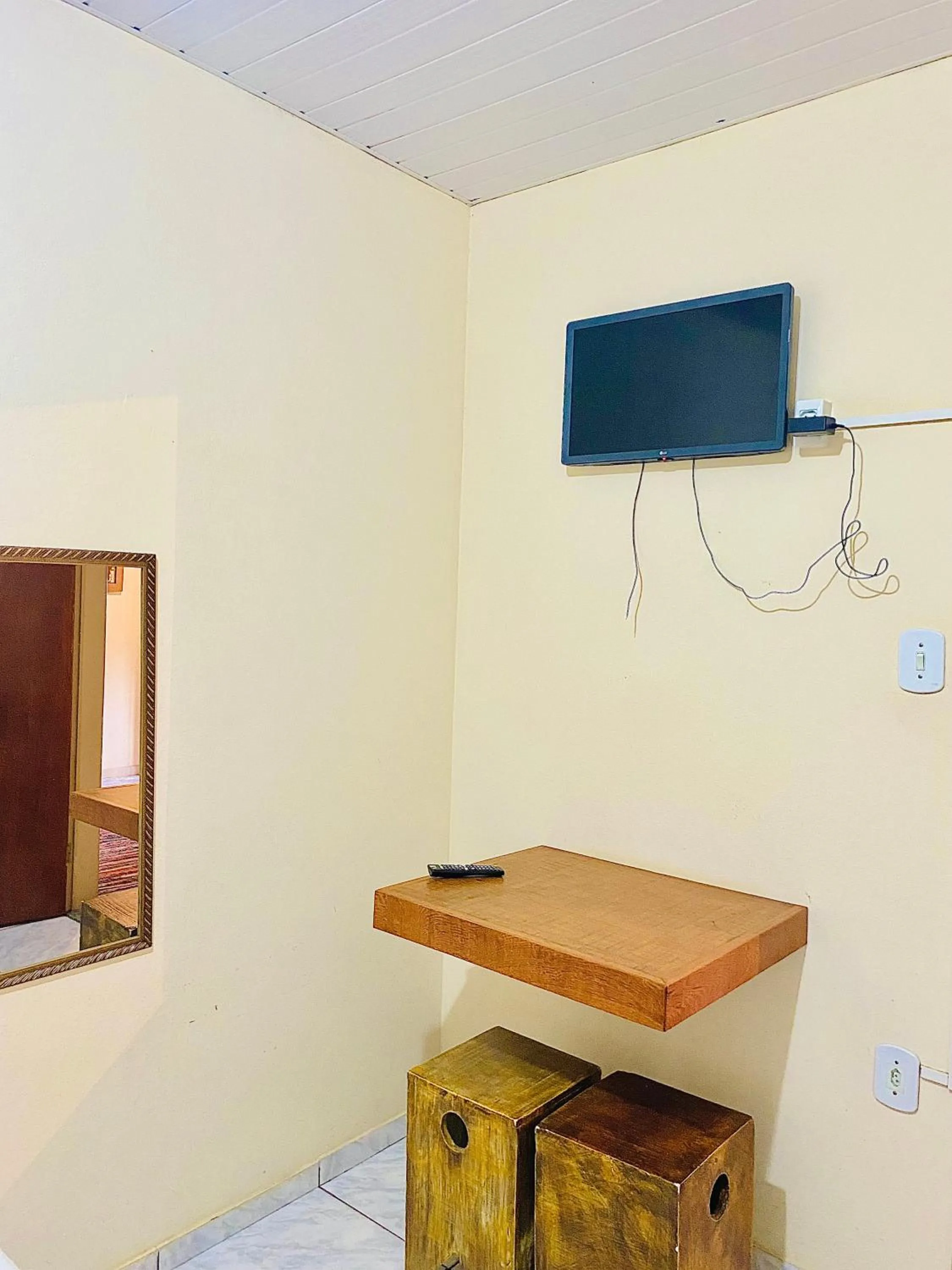 TV and multimedia in Hospedaria Vila Rica - 1 km do centro histórico