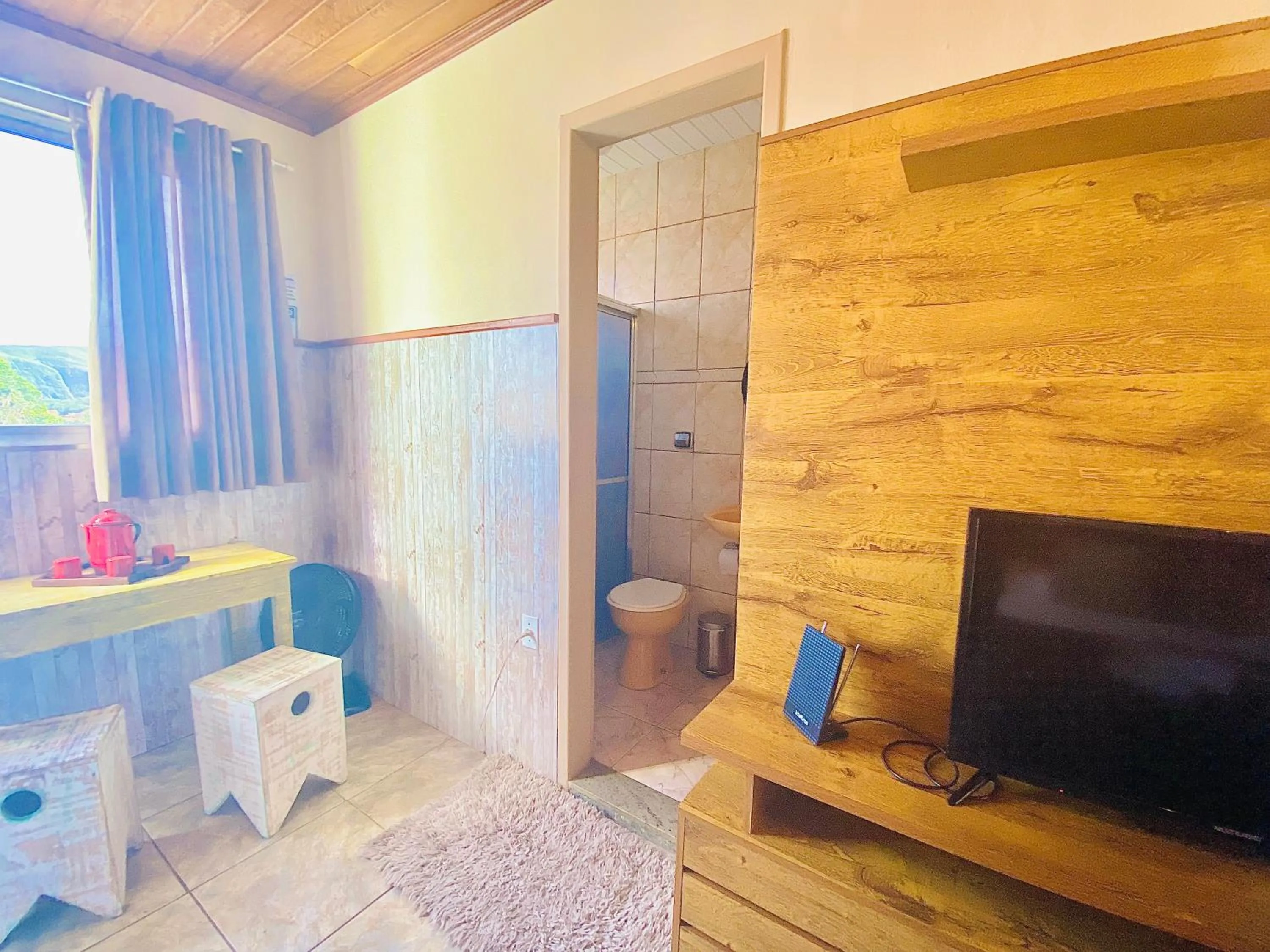 Photo of the whole room in Hospedaria Vila Rica - 1 km do centro histórico