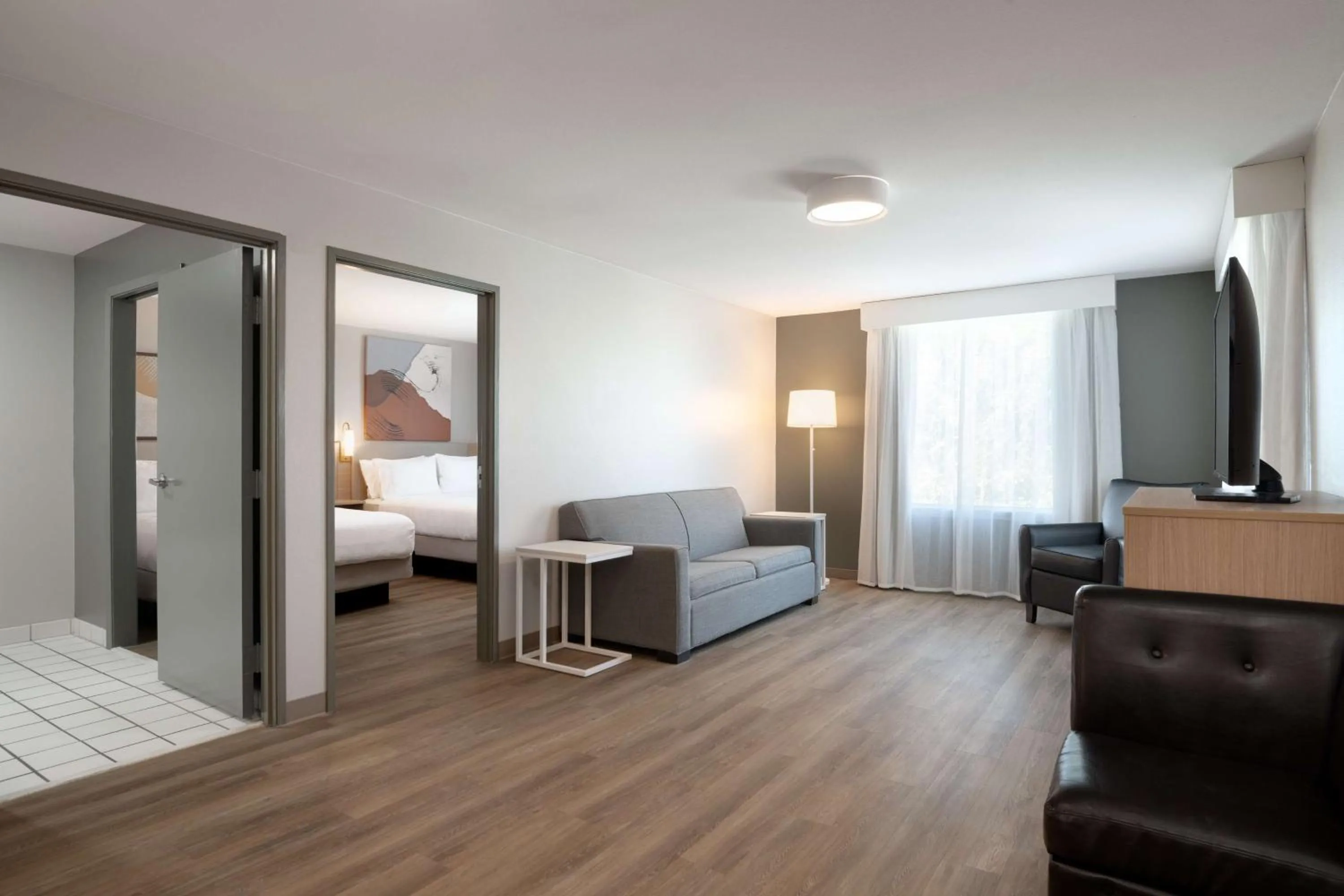 Living room, Bed in Spark by Hilton Destin