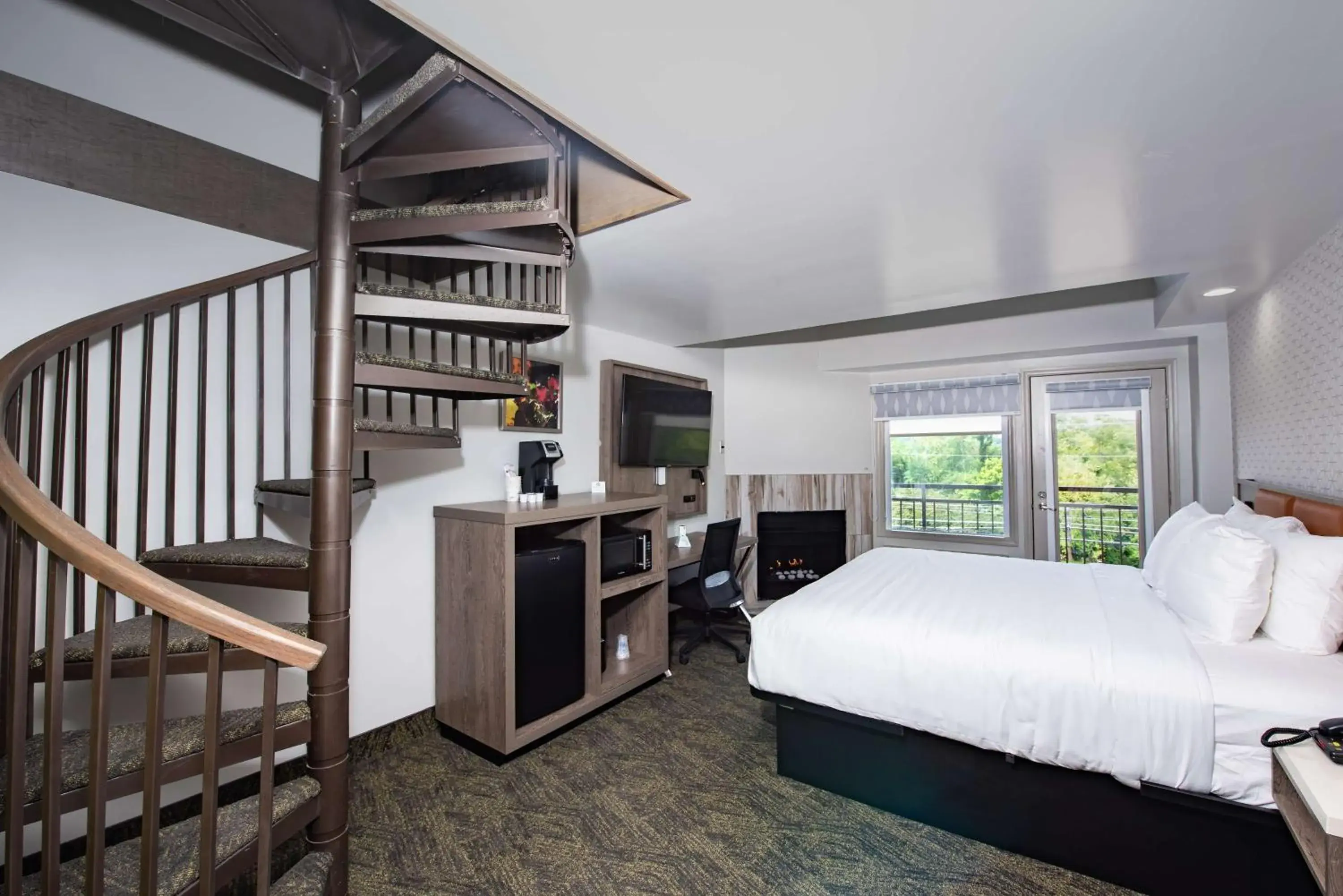 Loft King Room with Bunk Bed and Balcony - Fireplace in Best Western Plus Apple Valley Lodge Pigeon Forge Loft King Room with Bunk Bed and Balcony - Fireplace in Best Western Plus Apple Valley Lodge Pigeon Forge