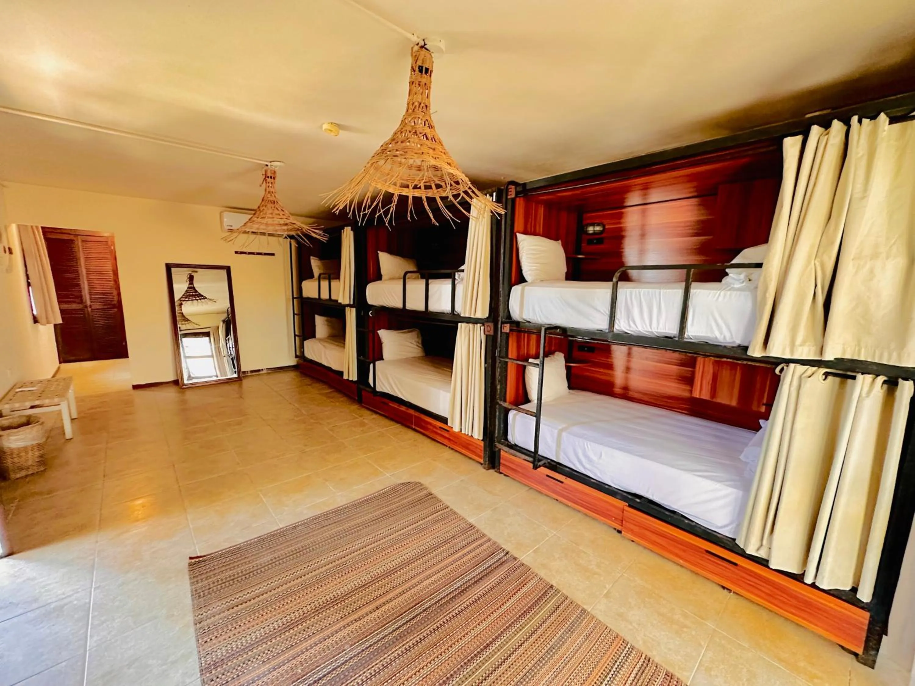 Bed in Mia Tulum Beachfront Resort - Ocean View Suites and Beach Club