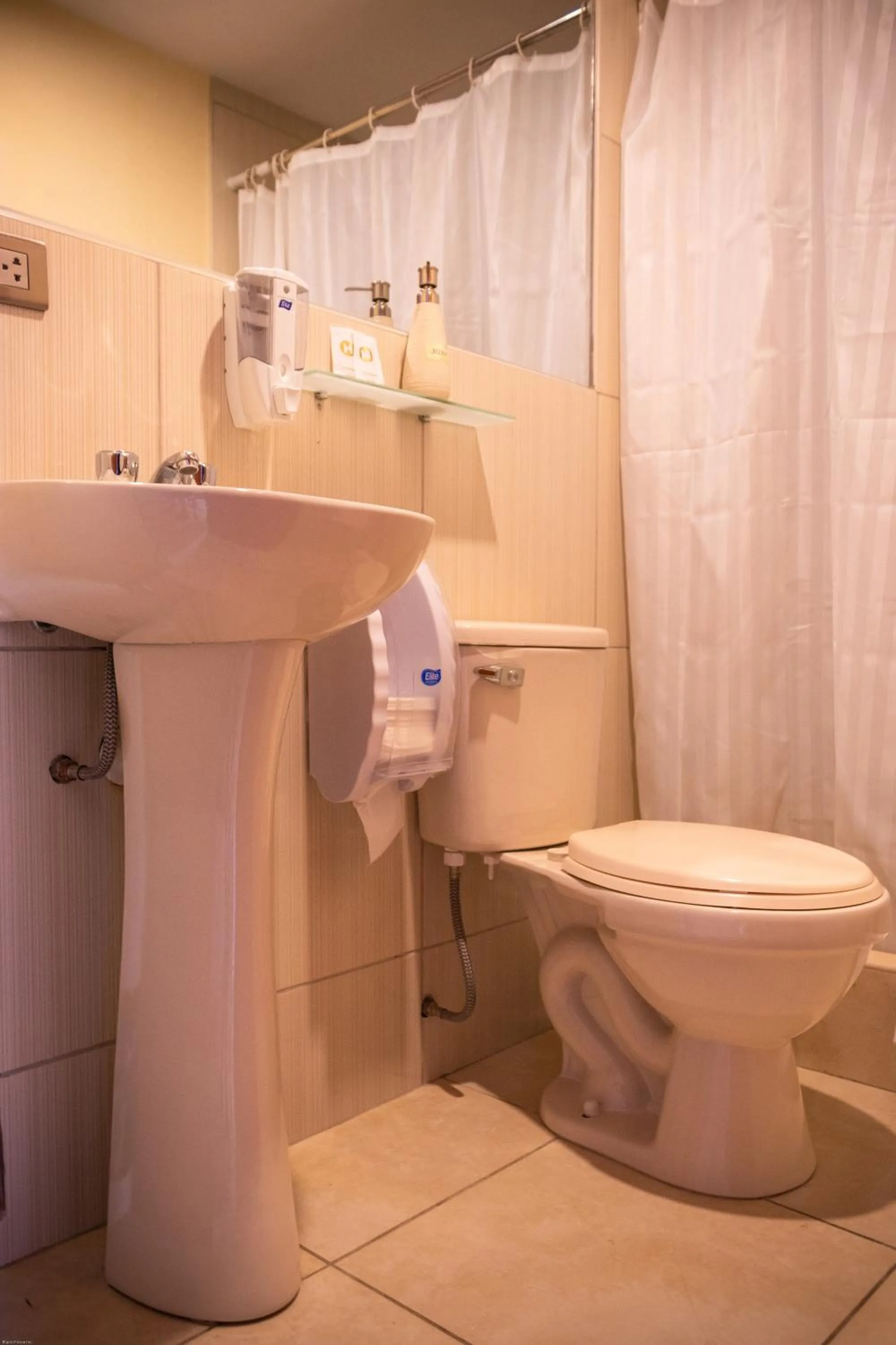 Toilet in Home Garden Hotel