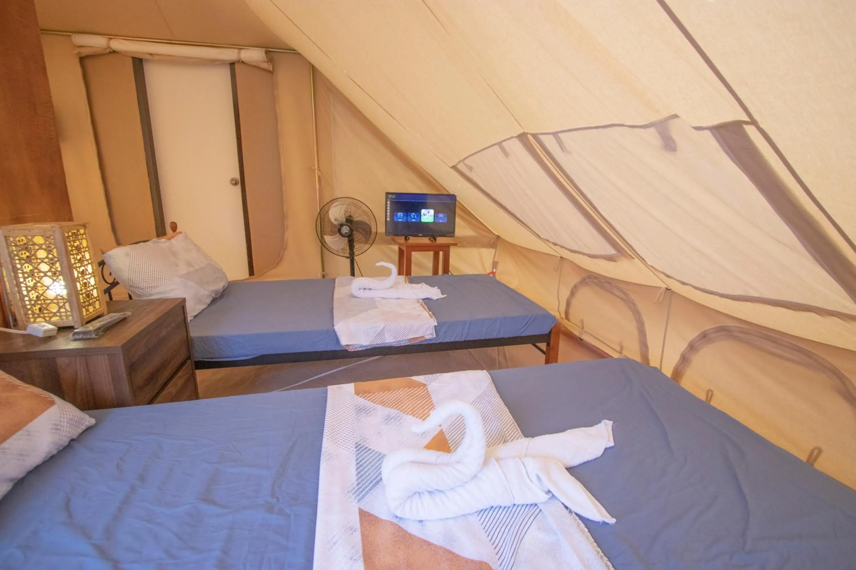 Bed in The Acacia Glamping Park