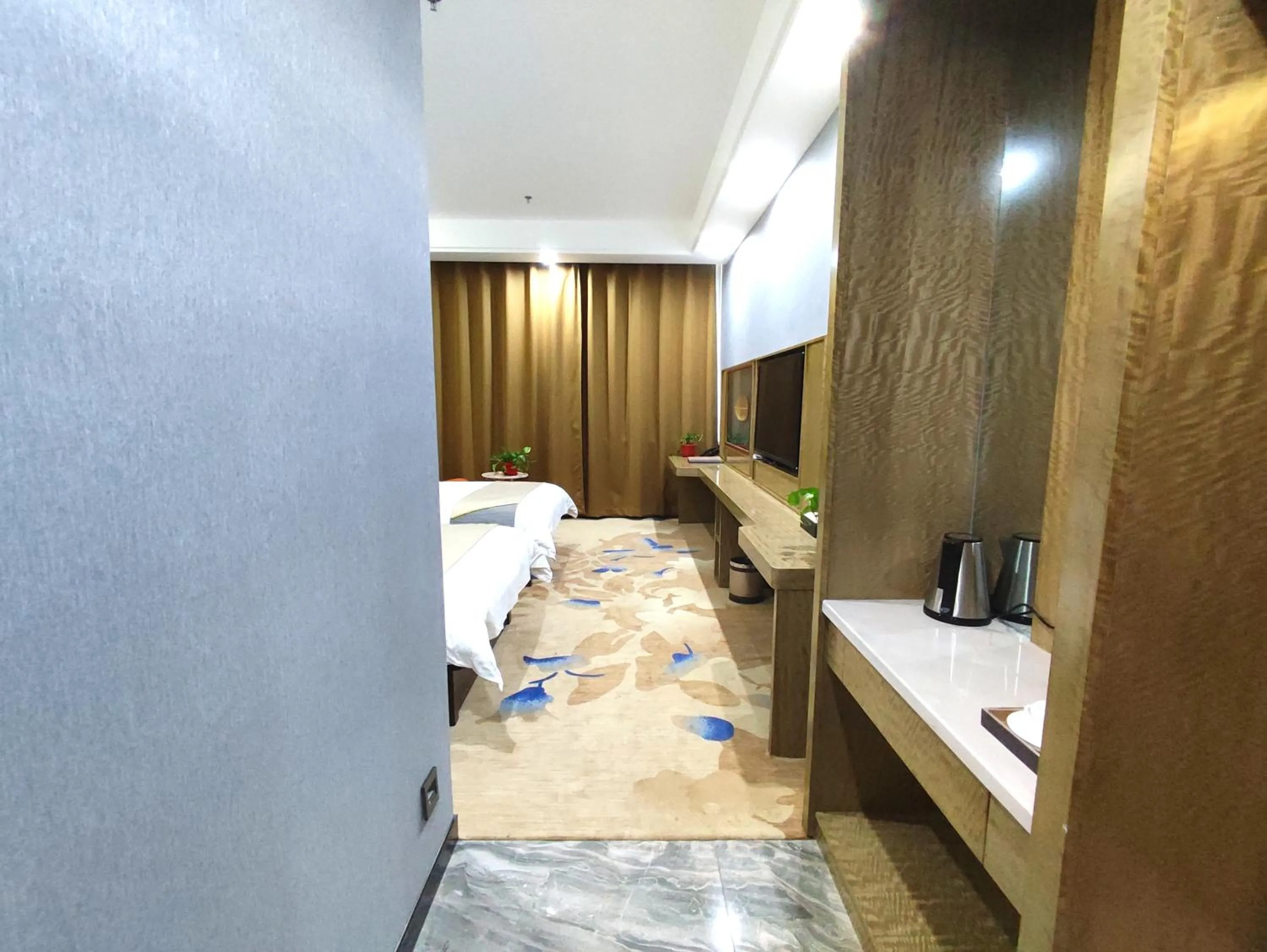 Photo of the whole room, Bed in Zhangye KAI RUI Hotel