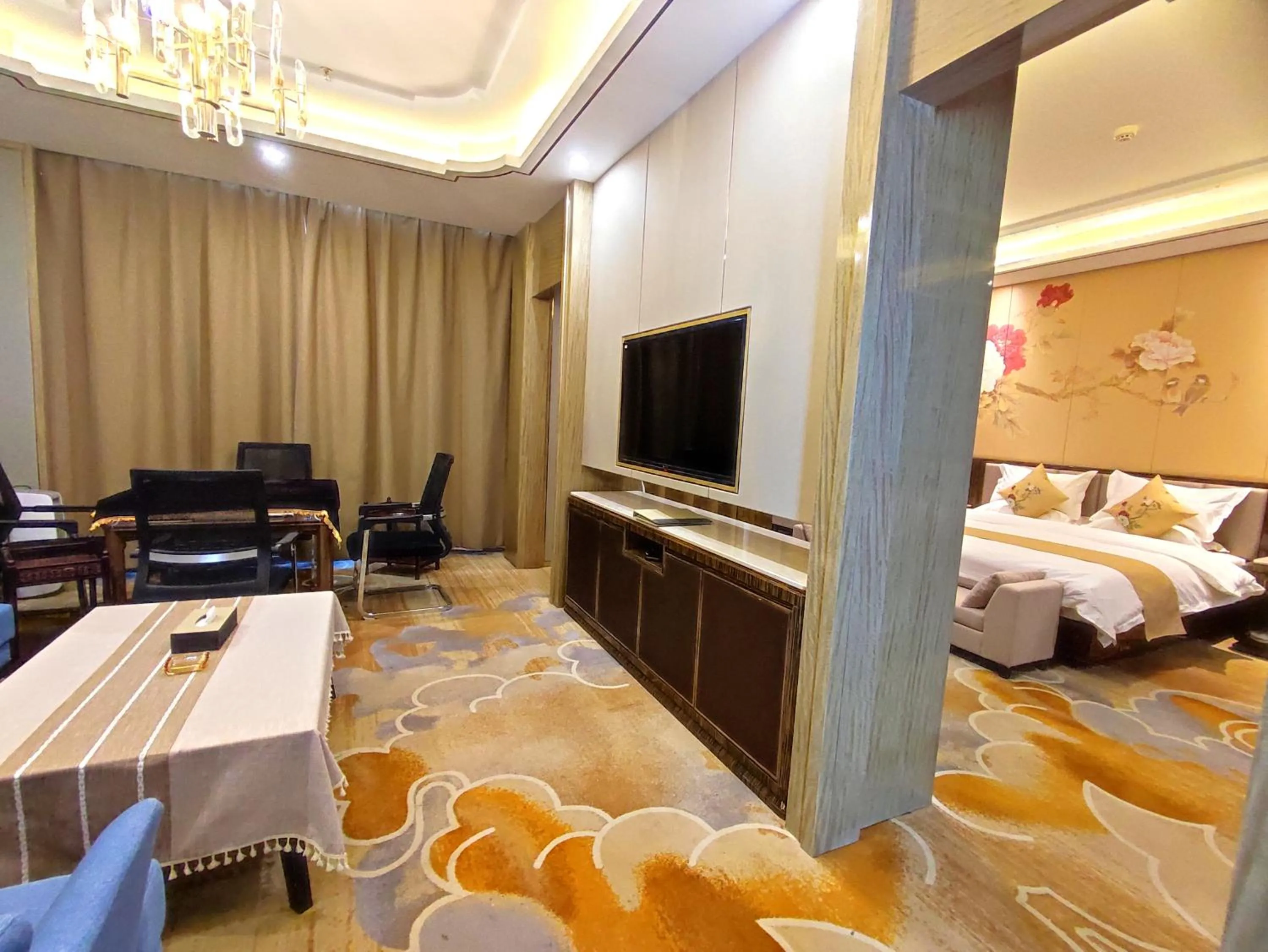 Living room, Bed in Zhangye KAI RUI Hotel