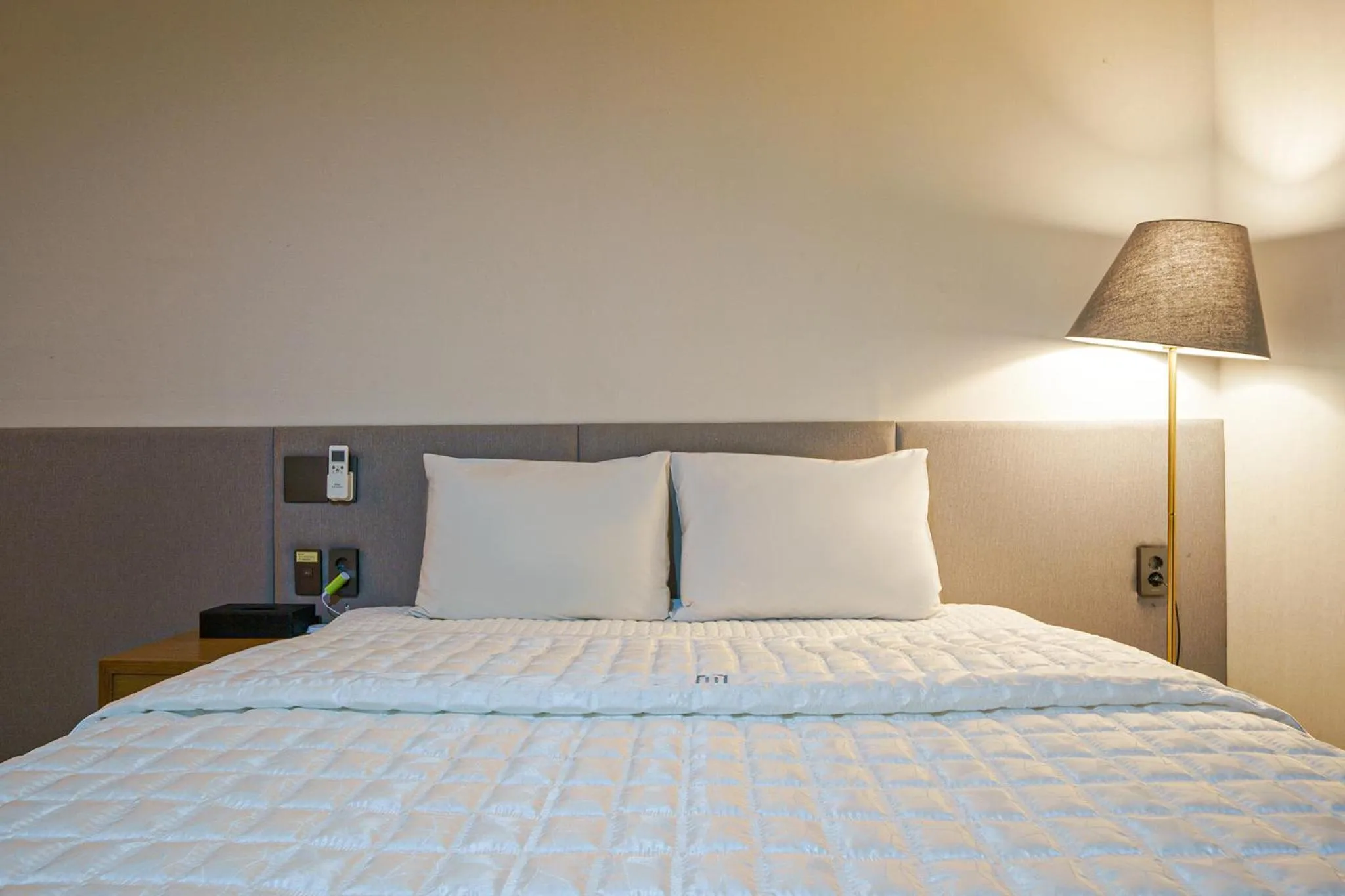 Bed in MTM Family Hotel