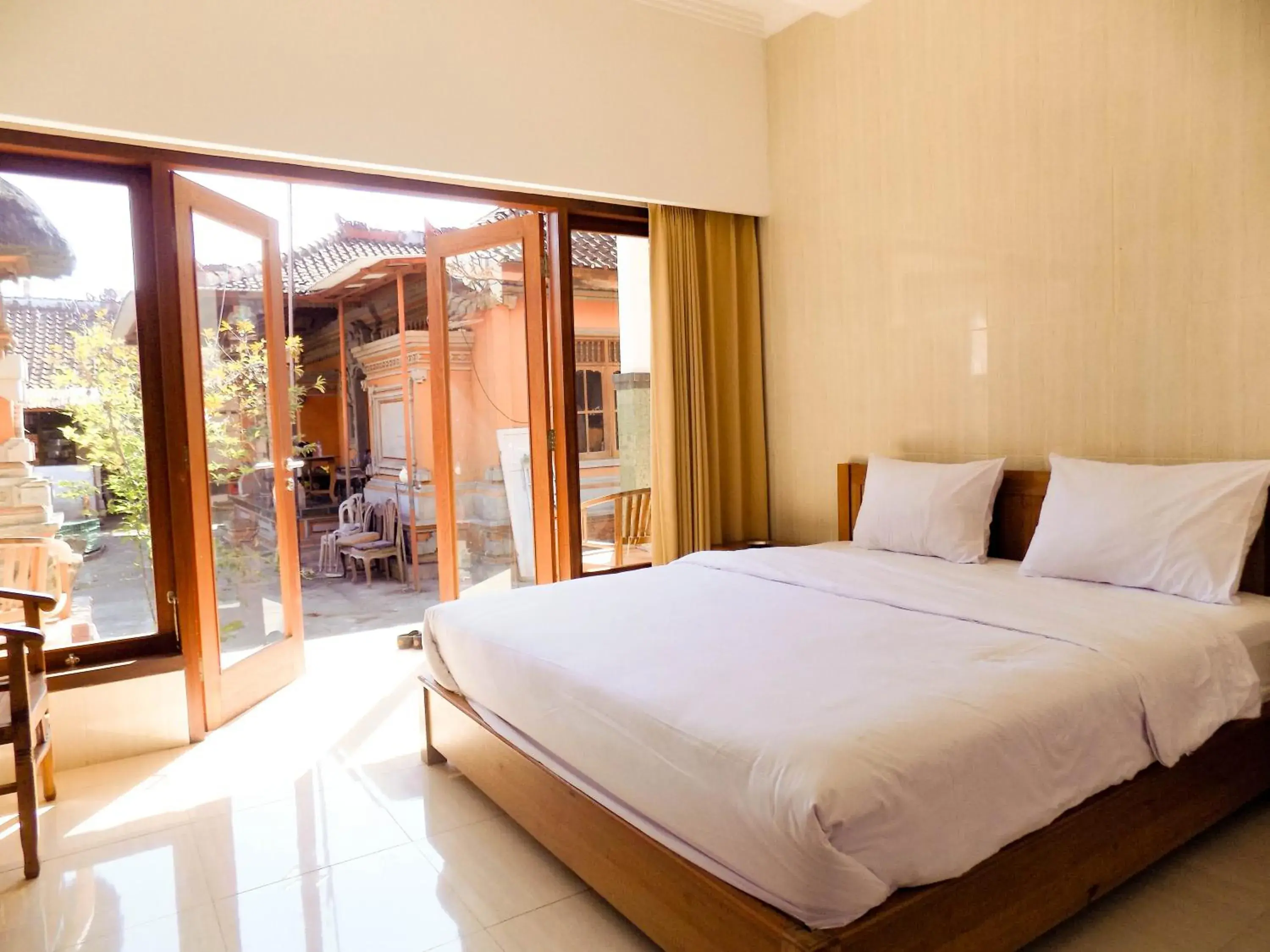 Bedroom, Bed in Guna Graha Kuta by Kamara Bedroom, Bed in Guna Graha Kuta by Kamara