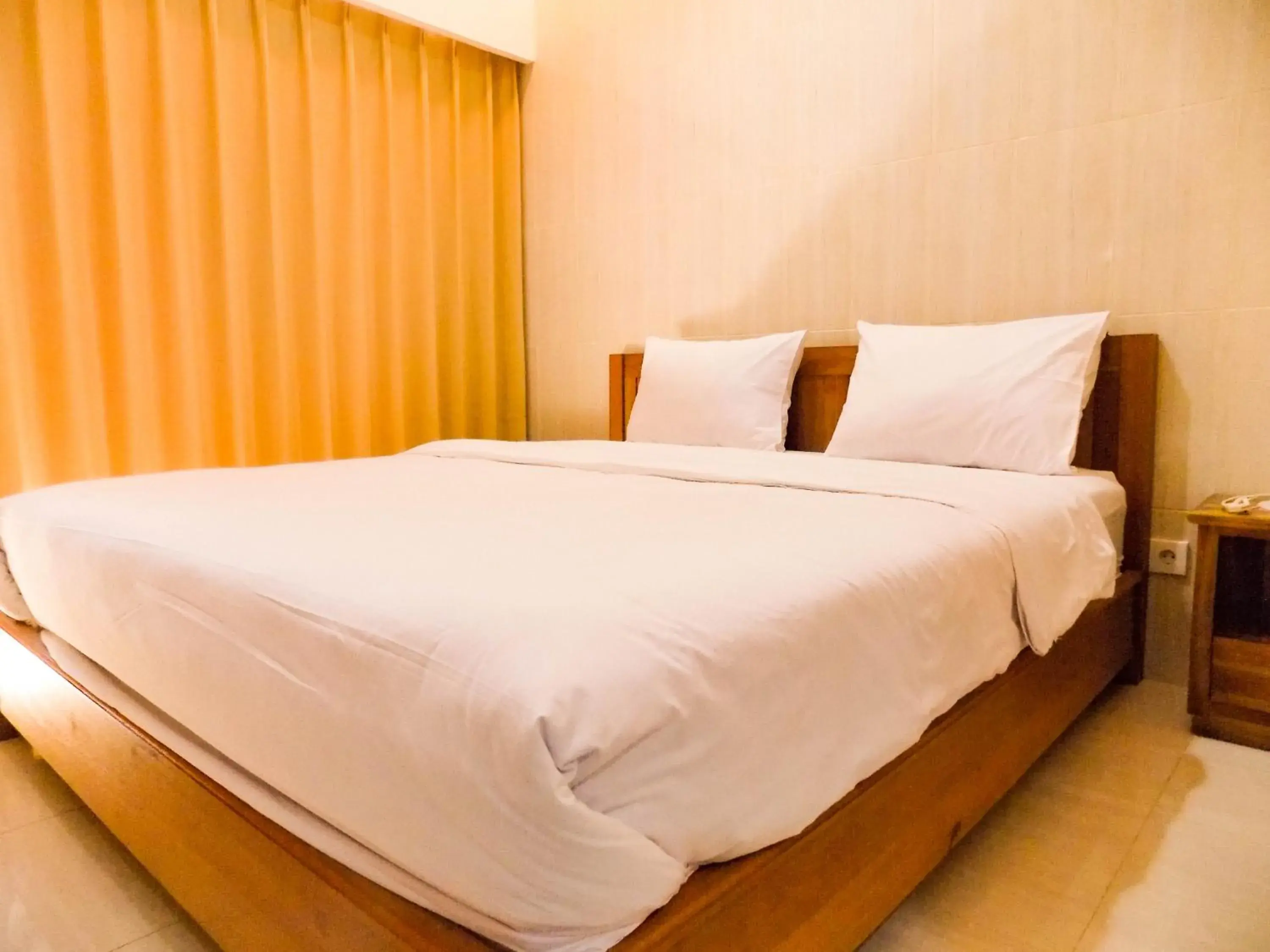 Deluxe Double Room in Guna Graha Kuta by Kamara Deluxe Double Room in Guna Graha Kuta by Kamara