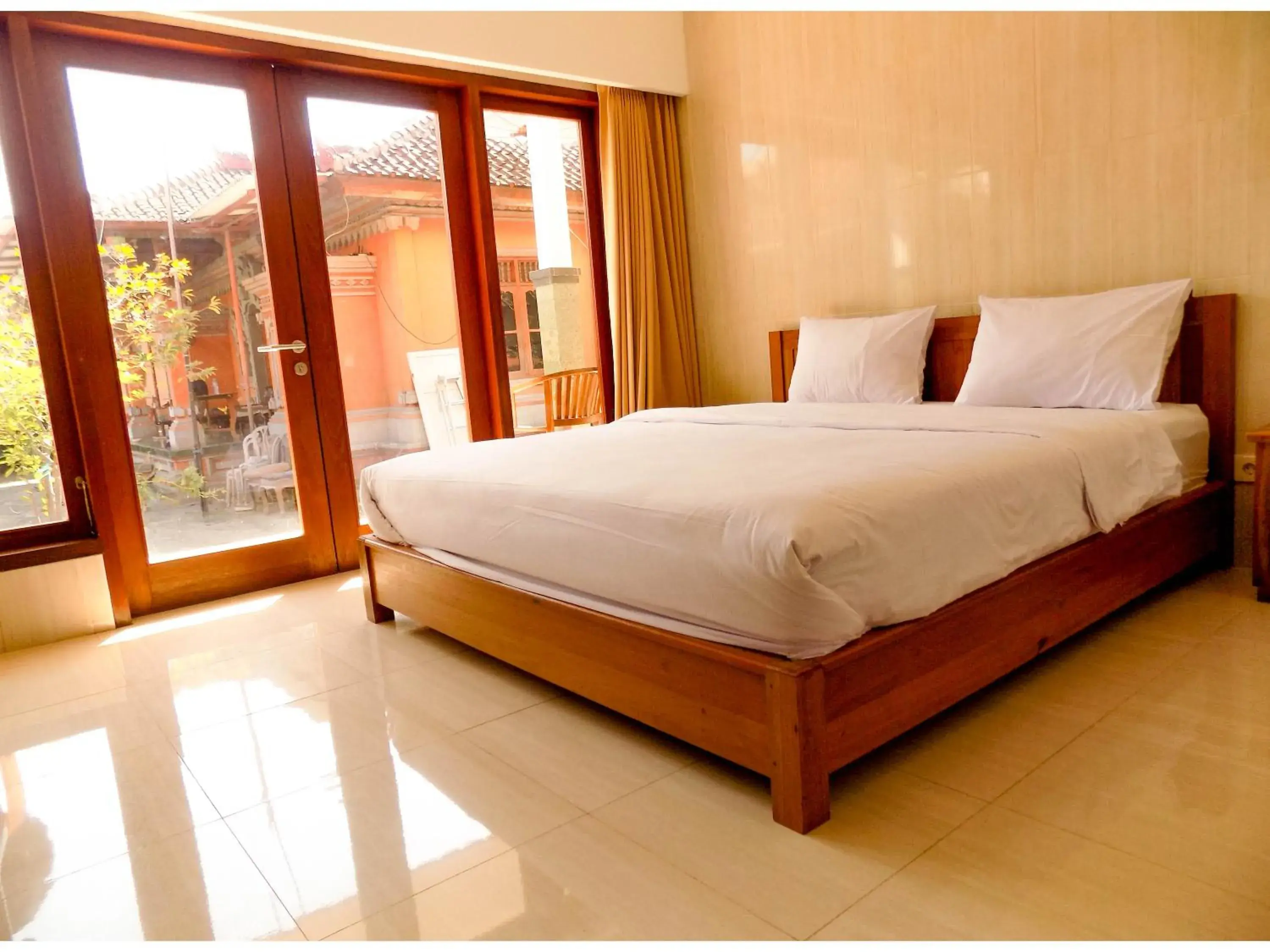 Bedroom, Bed in Guna Graha Kuta by Kamara Bedroom, Bed in Guna Graha Kuta by Kamara