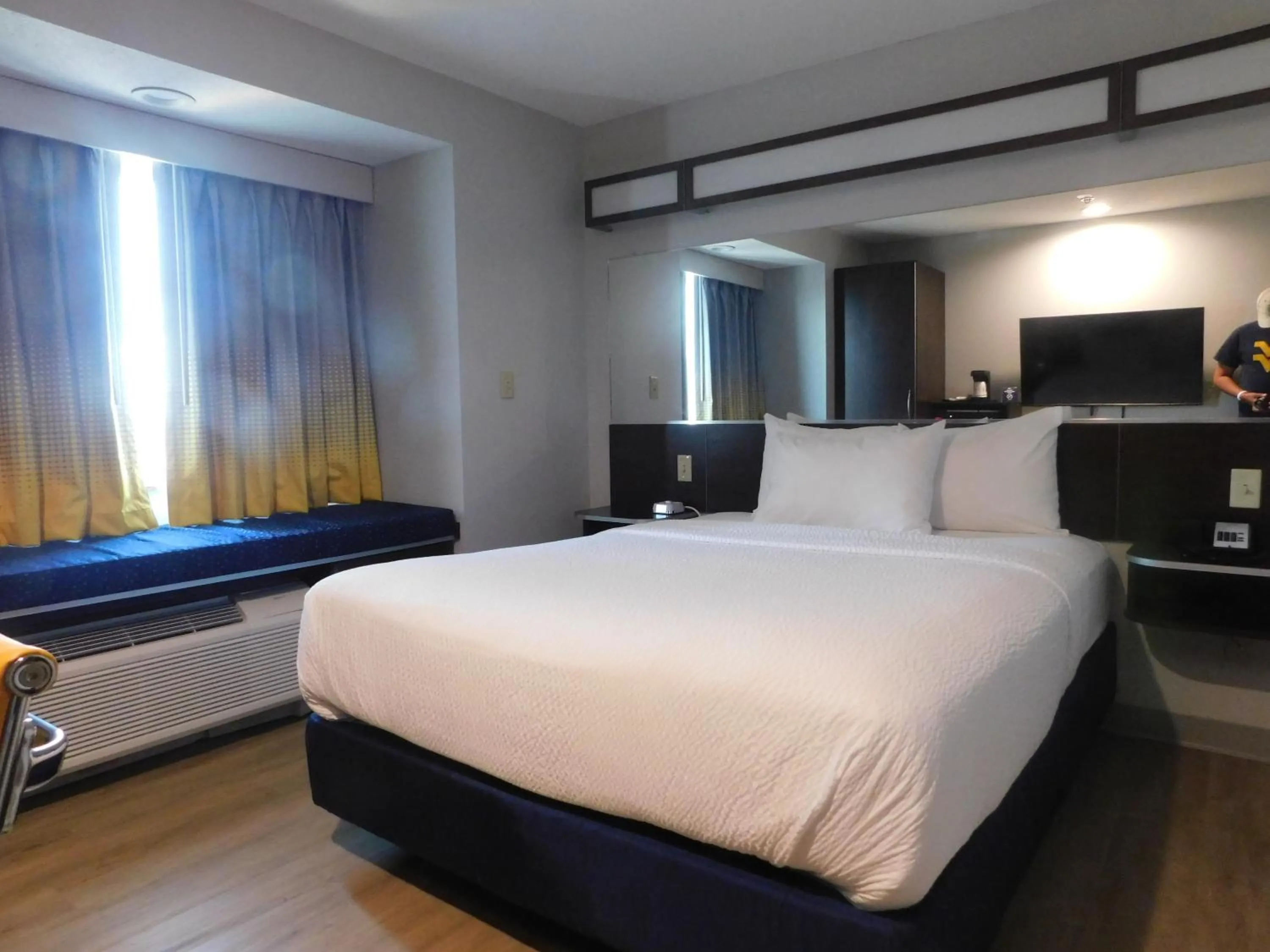 Bed in Microtel Inn & Suites by Wyndham Wheeling at The Highlands