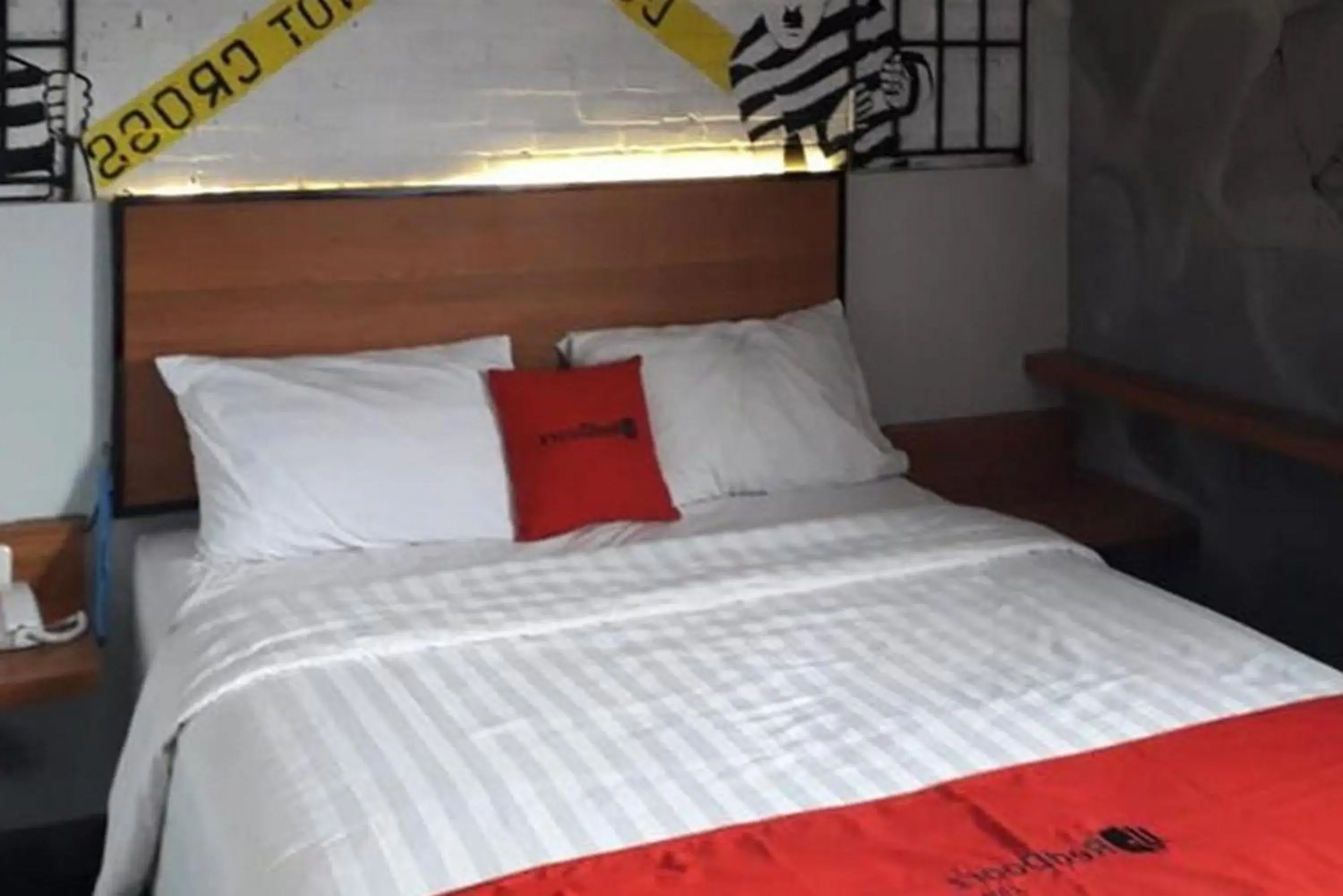 Bed in RedDoorz Plus @ Doorman Guest House Bed in RedDoorz Plus @ Doorman Guest House