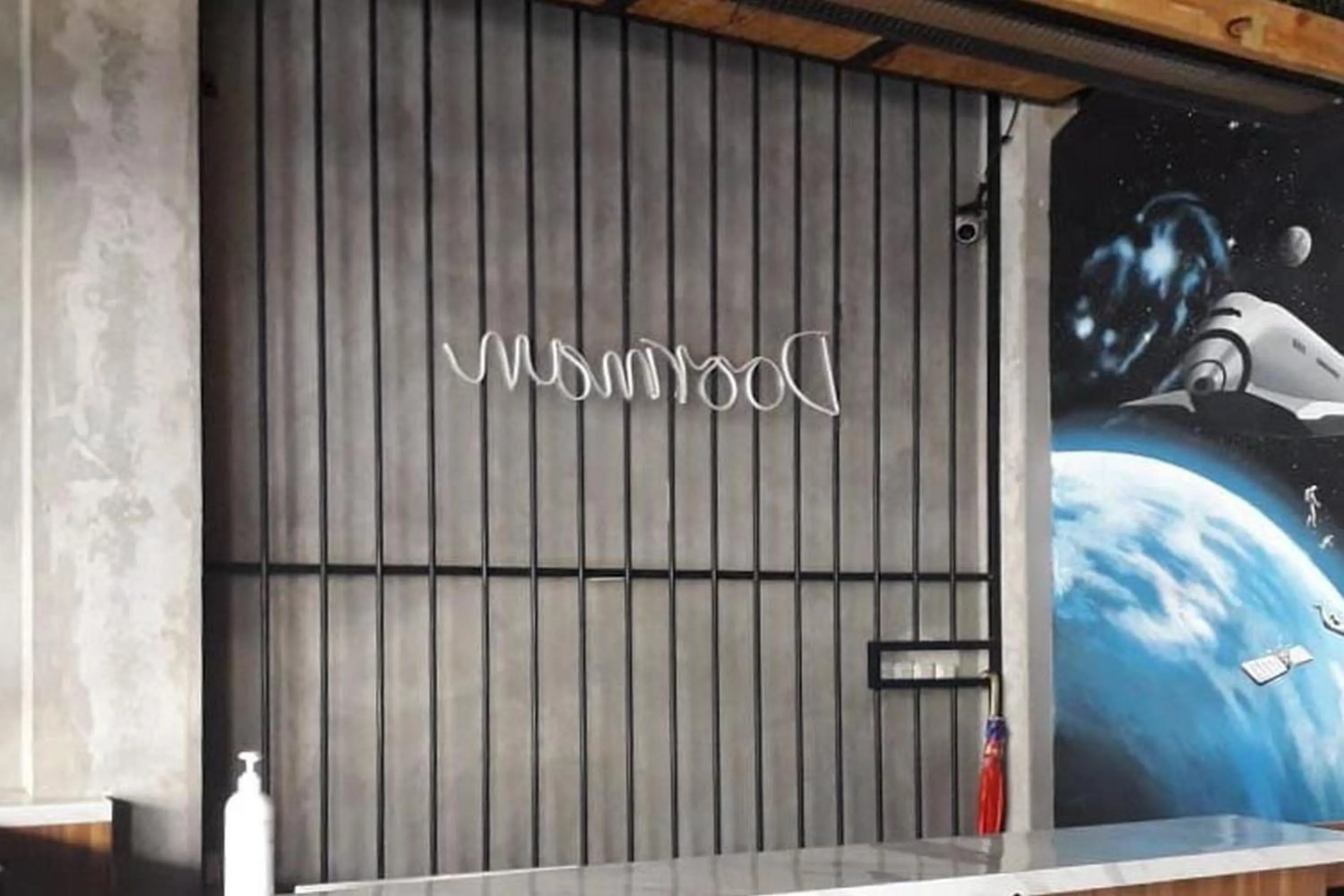 Property logo or sign in RedDoorz Plus @ Doorman Guest House