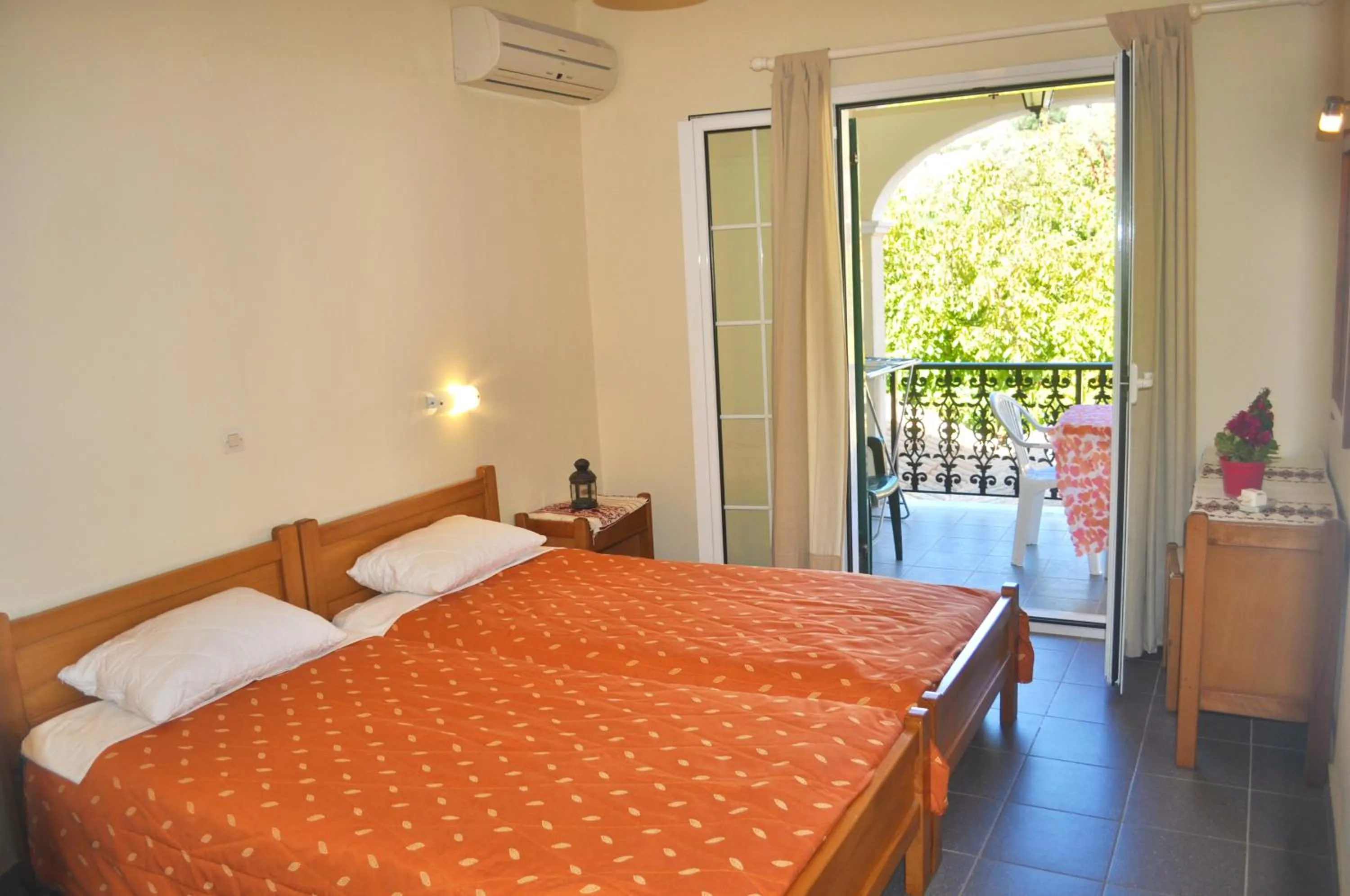 Bedroom, Bed in Holiday Apartments yannis on Agios Gordios beach in Corfu