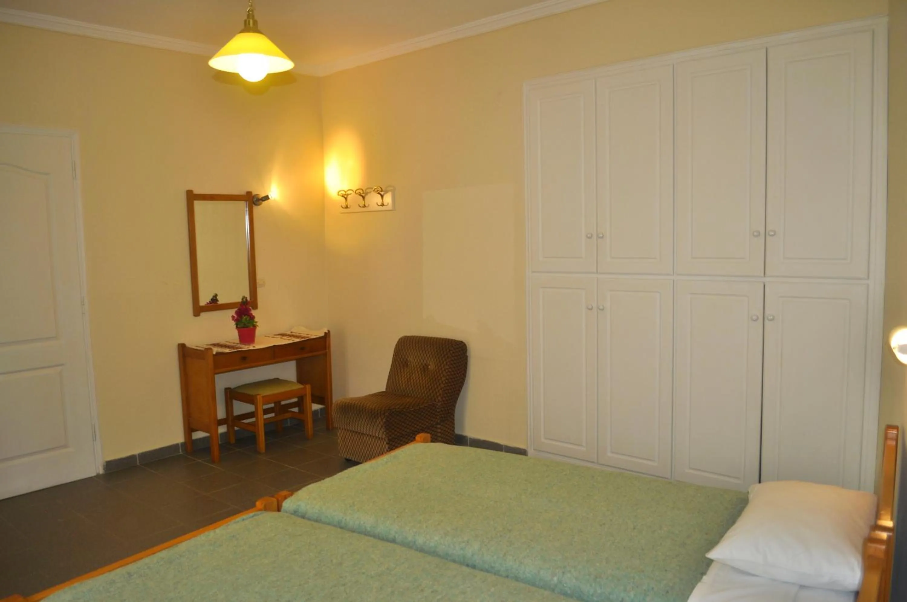 Bedroom, Bed in Holiday Apartments yannis on Agios Gordios beach in Corfu