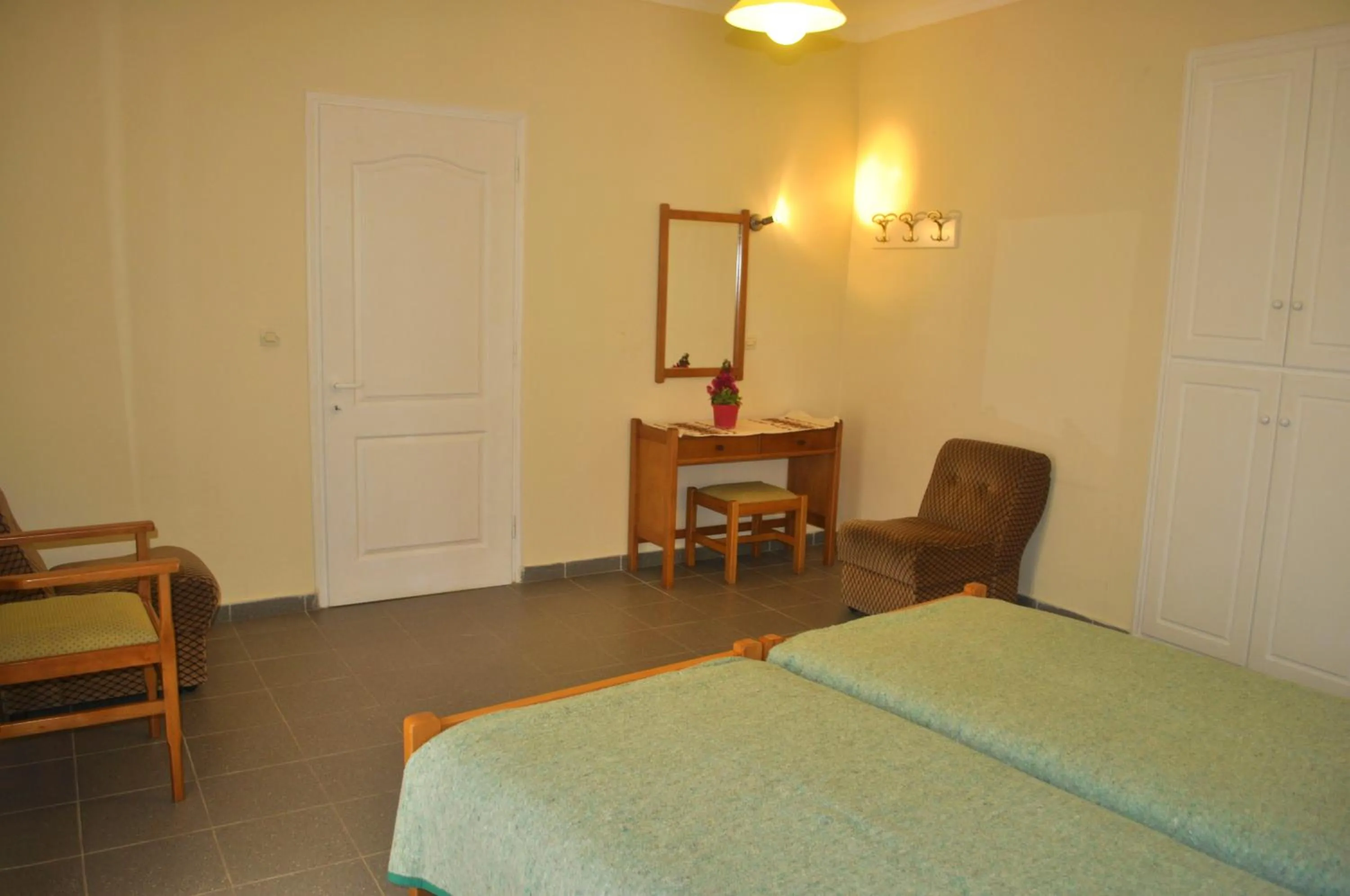 Bedroom, Bed in Holiday Apartments yannis on Agios Gordios beach in Corfu