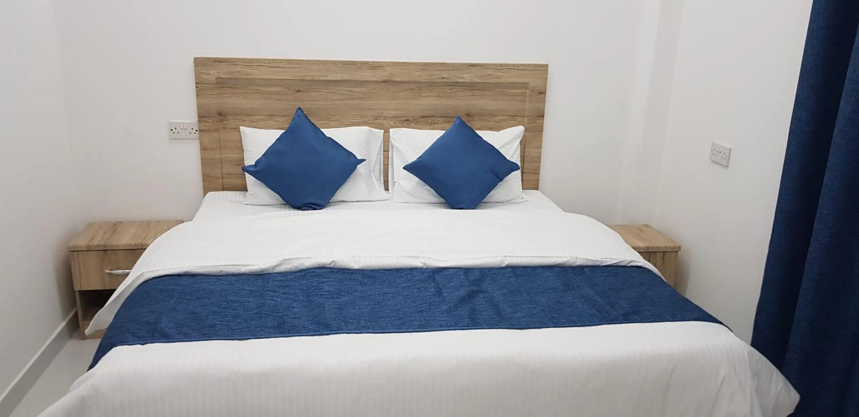 Bedroom, Bed in Duqm Suites