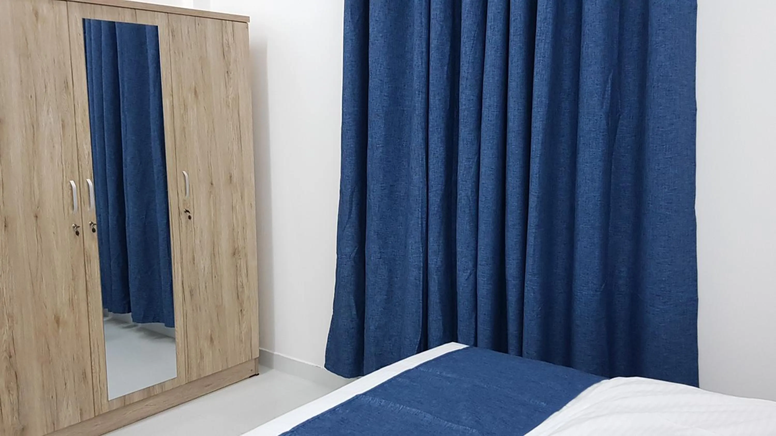 Bedroom, Bed in Duqm Suites