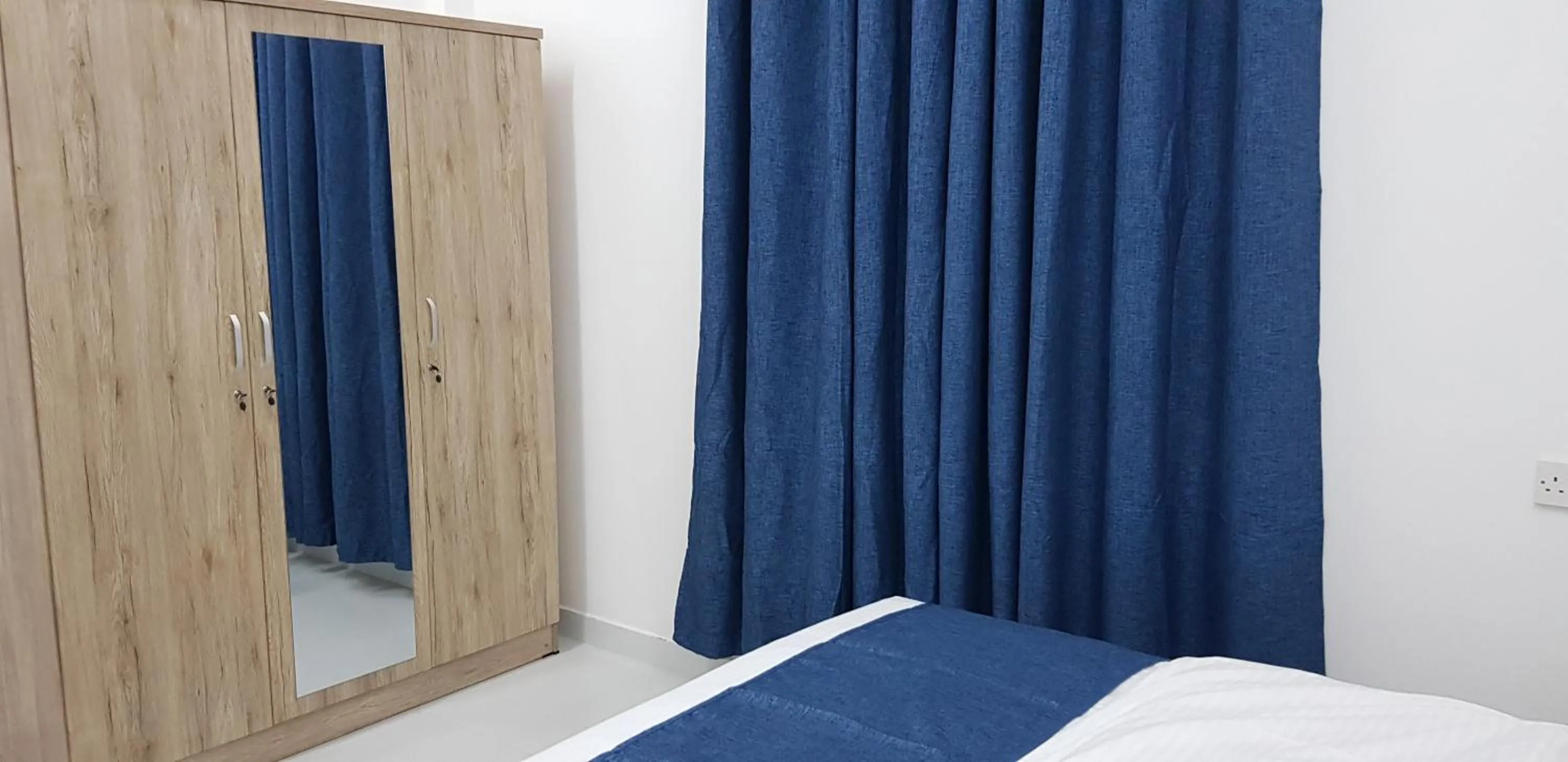 Bedroom, Bed in Duqm Suites