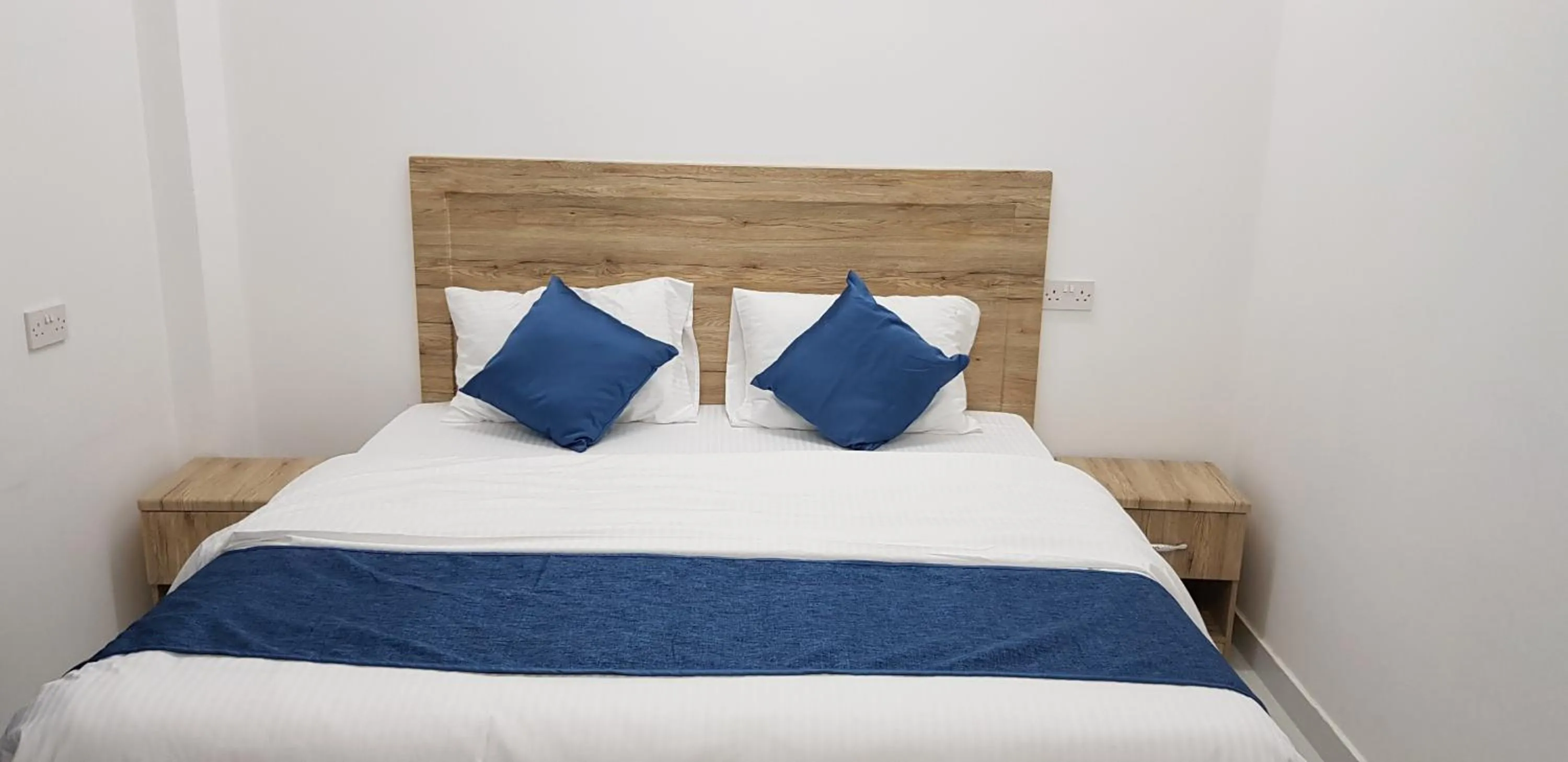 Bedroom, Bed in Duqm Suites