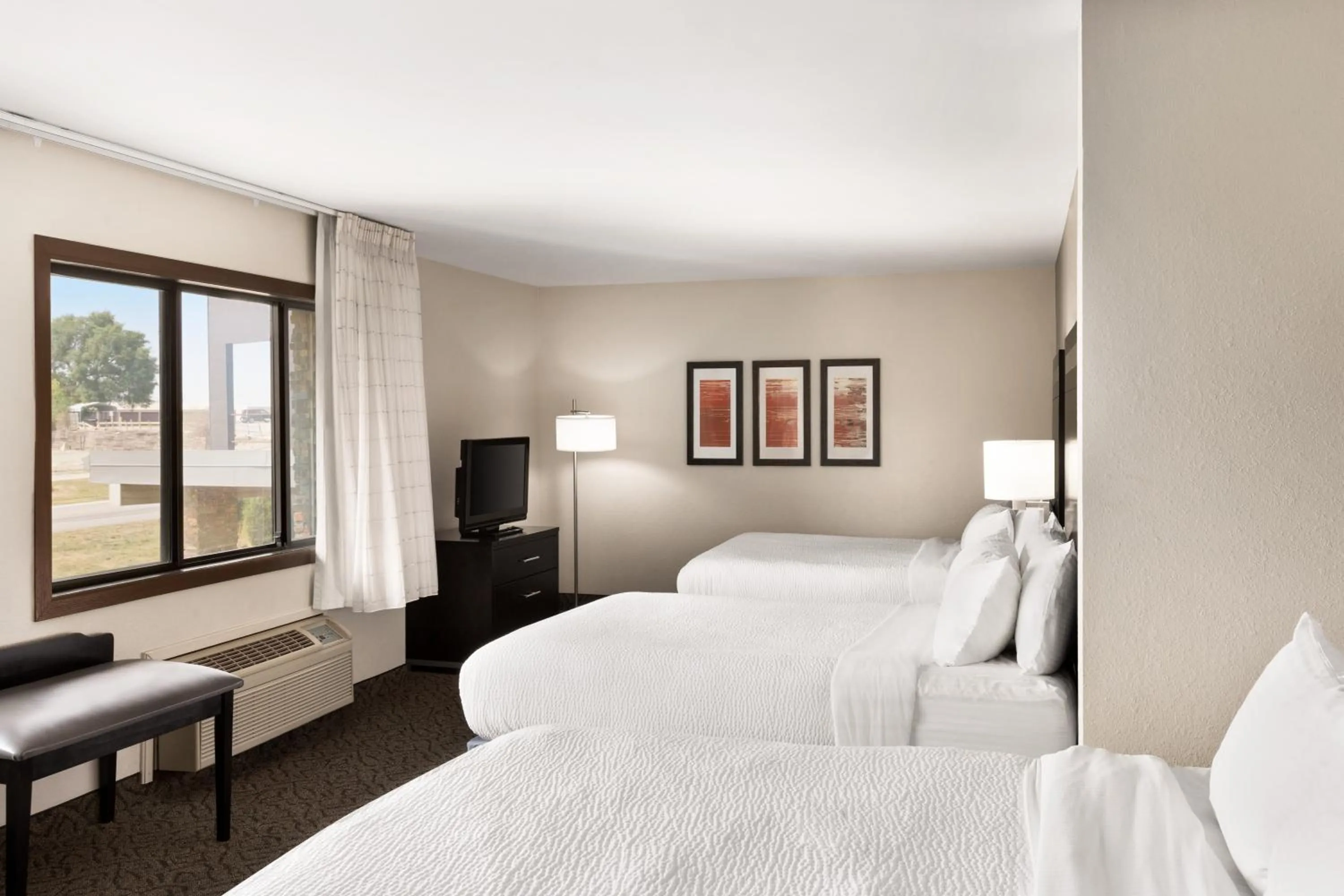 Bed in Carrollton Hotel