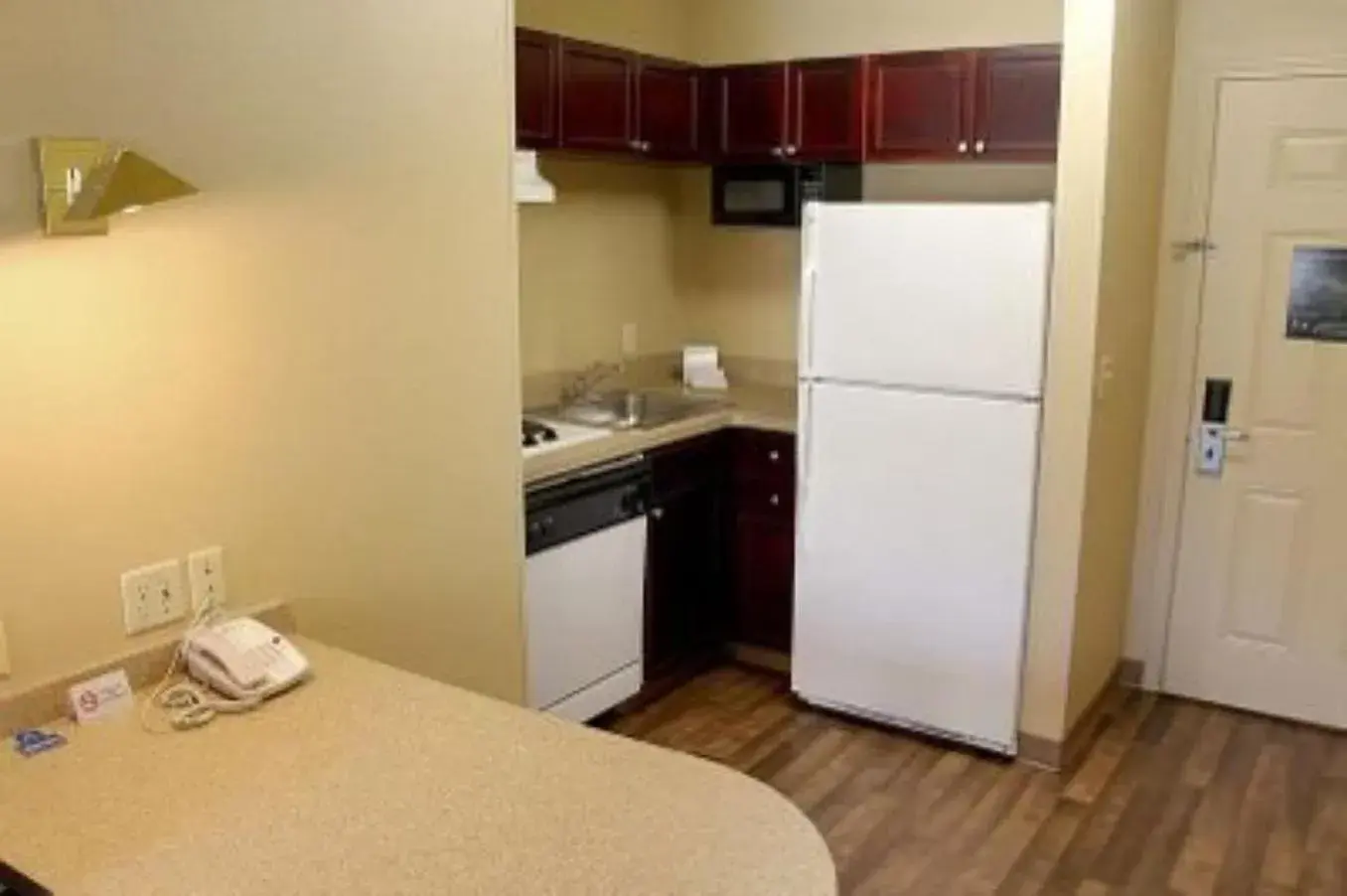 Photo of the whole room, Kitchen/Kitchenette in Lonestar Suites