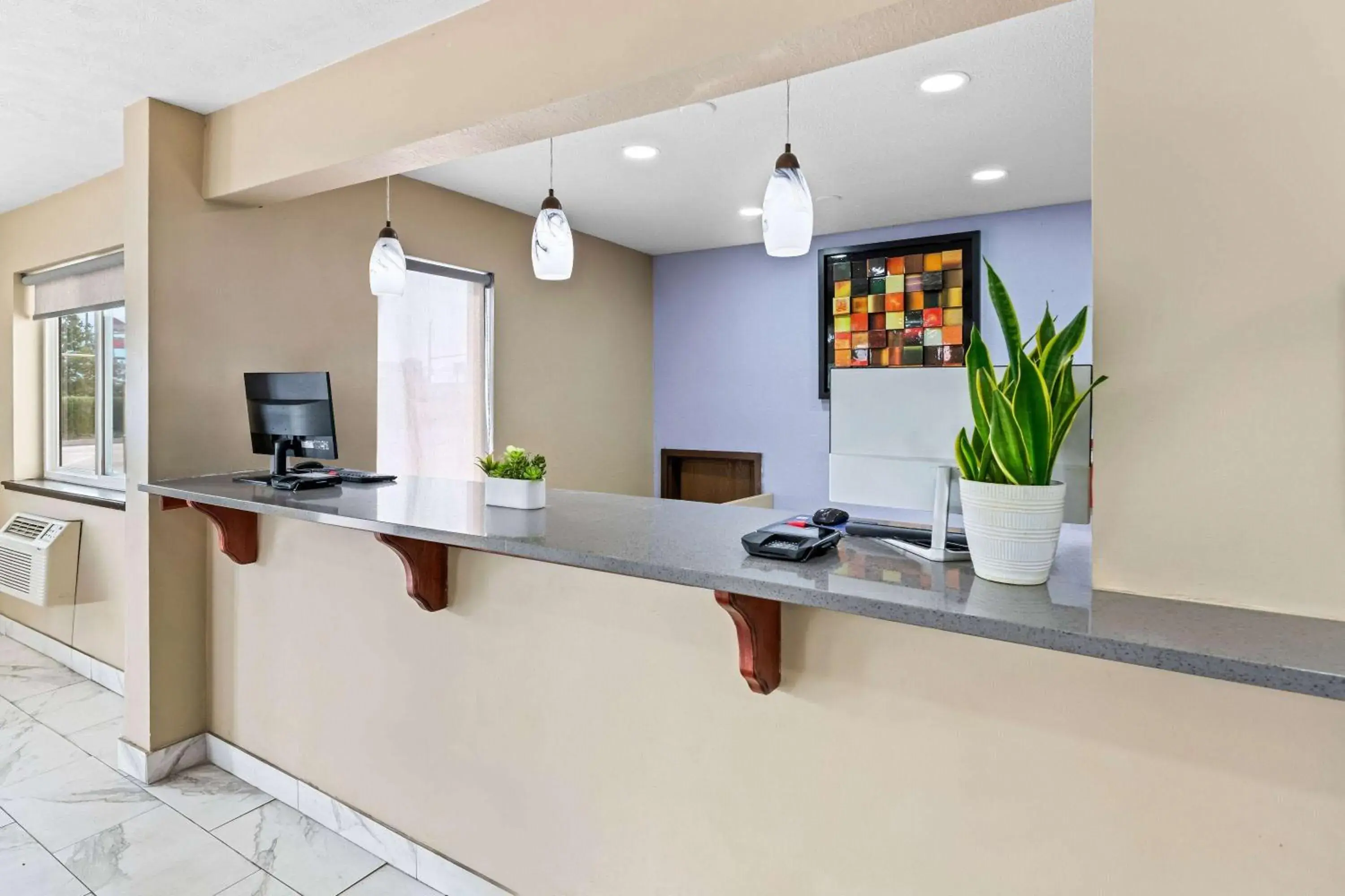 Lobby or reception in Super 8 by Wyndham Council Bluffs IA Omaha NE Area Lobby or reception in Super 8 by Wyndham Council Bluffs IA Omaha NE Area