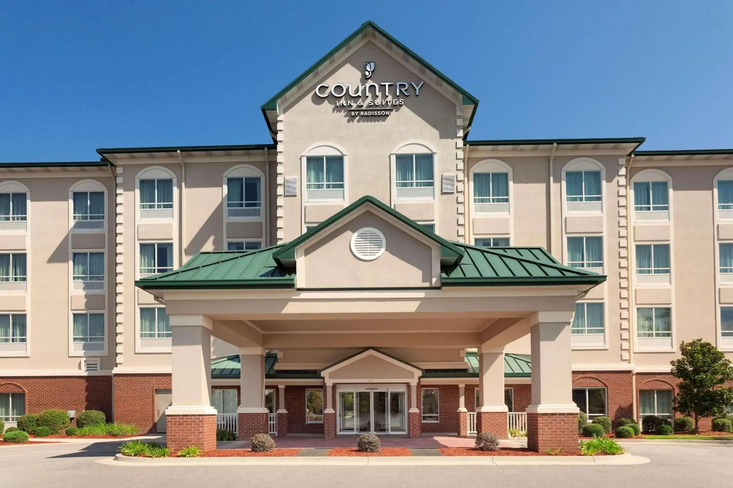 Property building in Country Inn & Suites by Radisson, Tifton, GA Property building in Country Inn & Suites by Radisson, Tifton, GA