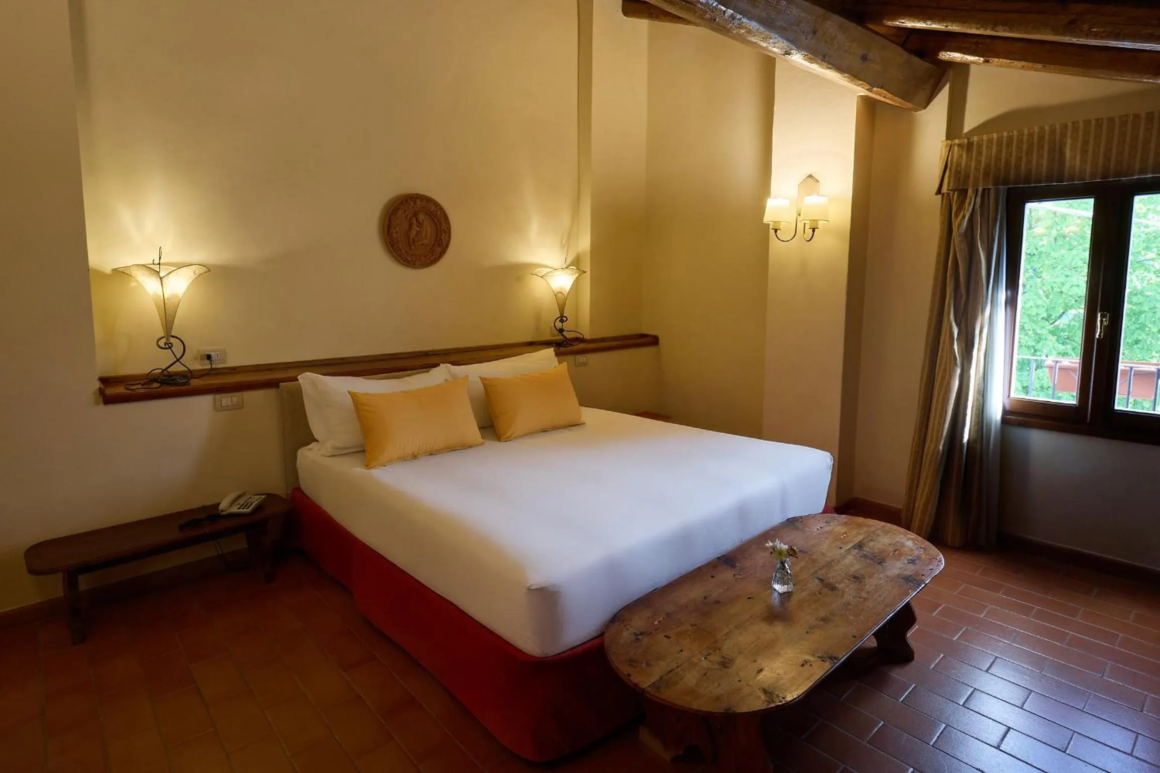 Bed in PALAZZO DE' ROSSI HOTEL