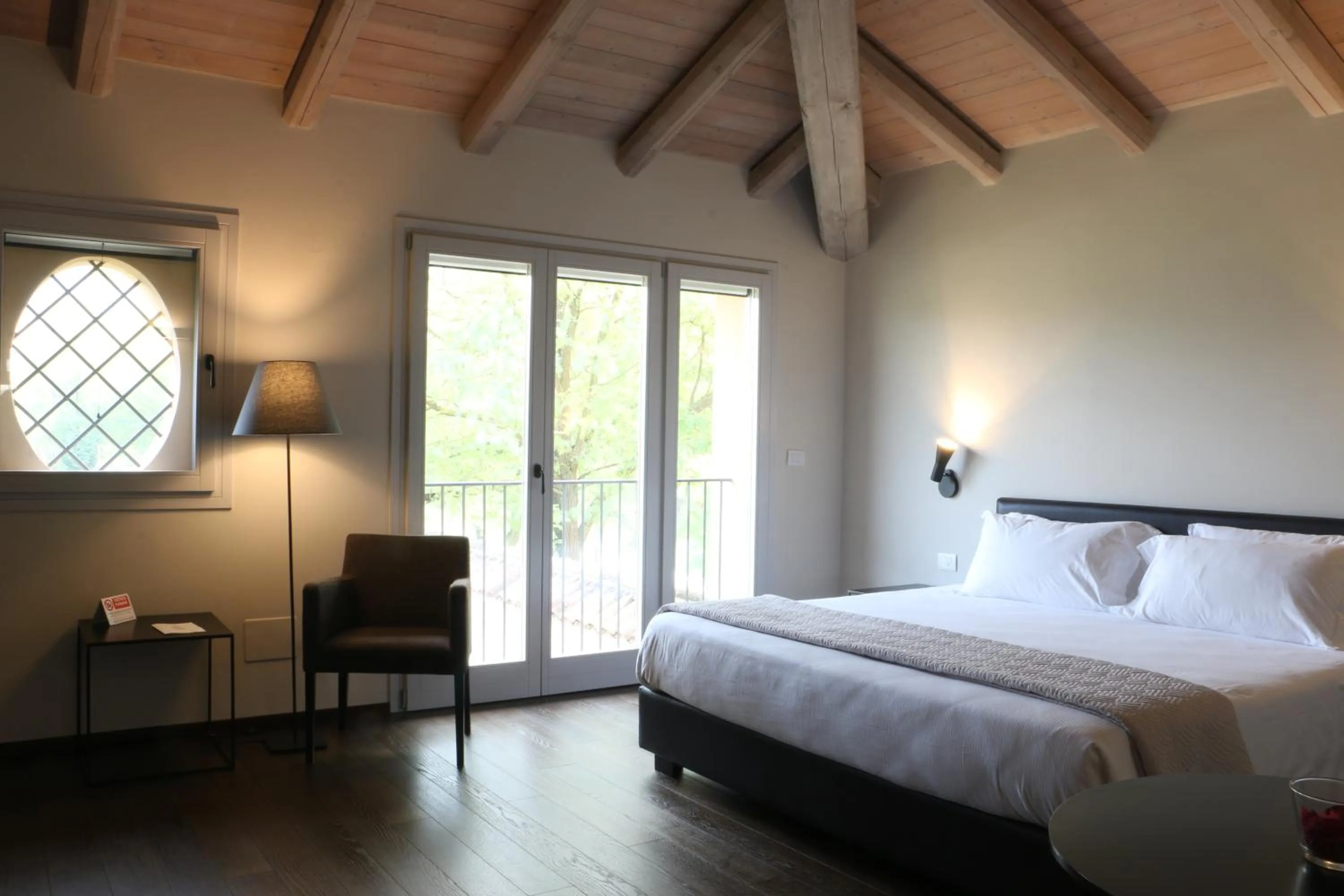 Bed in PALAZZO DE' ROSSI HOTEL