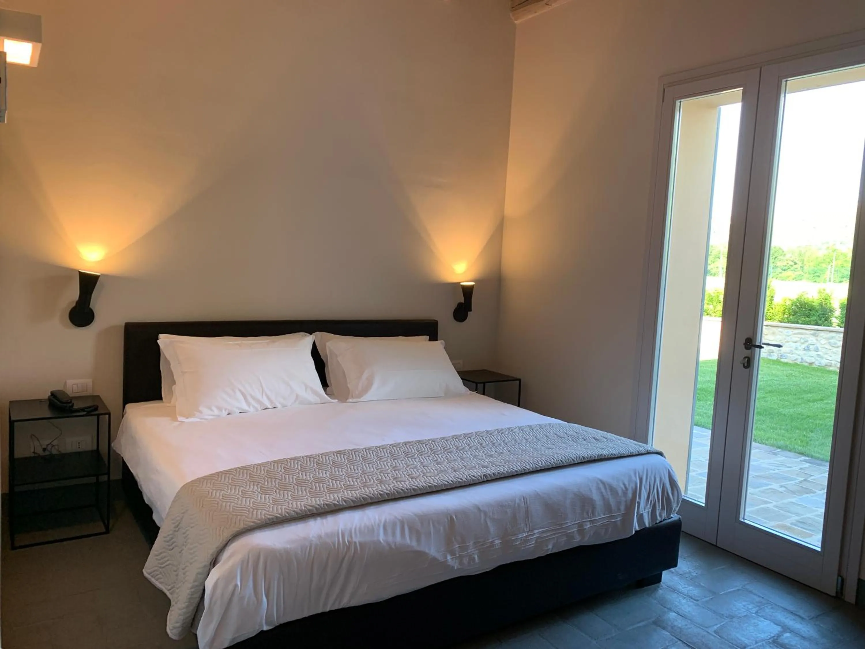 Bed in PALAZZO DE' ROSSI HOTEL