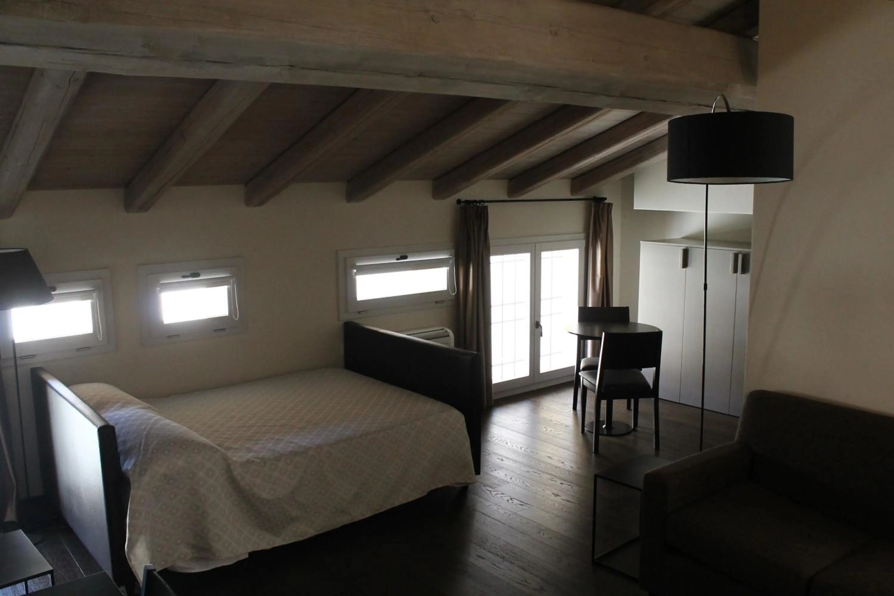 Bed in PALAZZO DE' ROSSI HOTEL