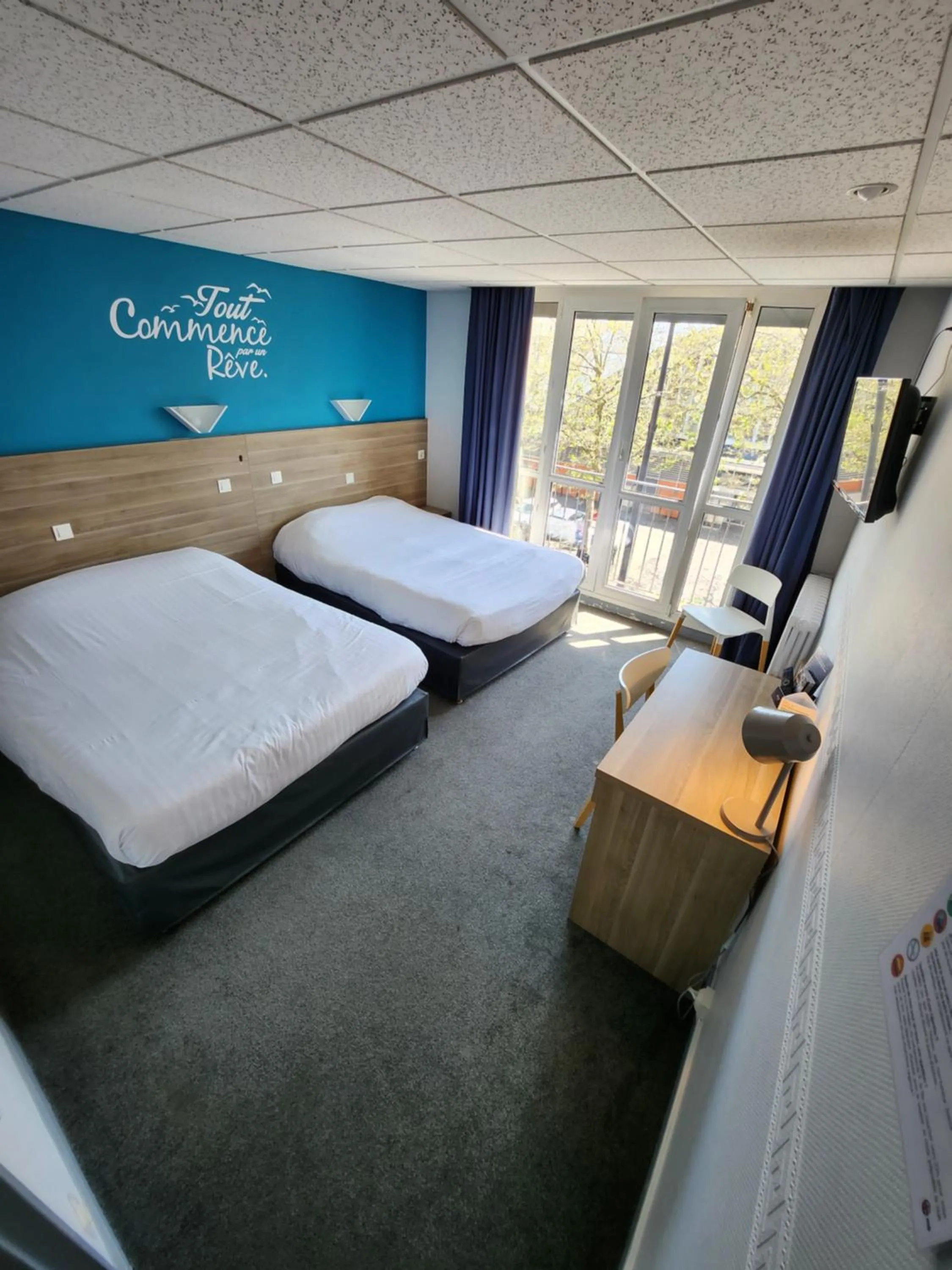 Bedroom in Hôtel Le Petit Vatel - Centre ville & Plage