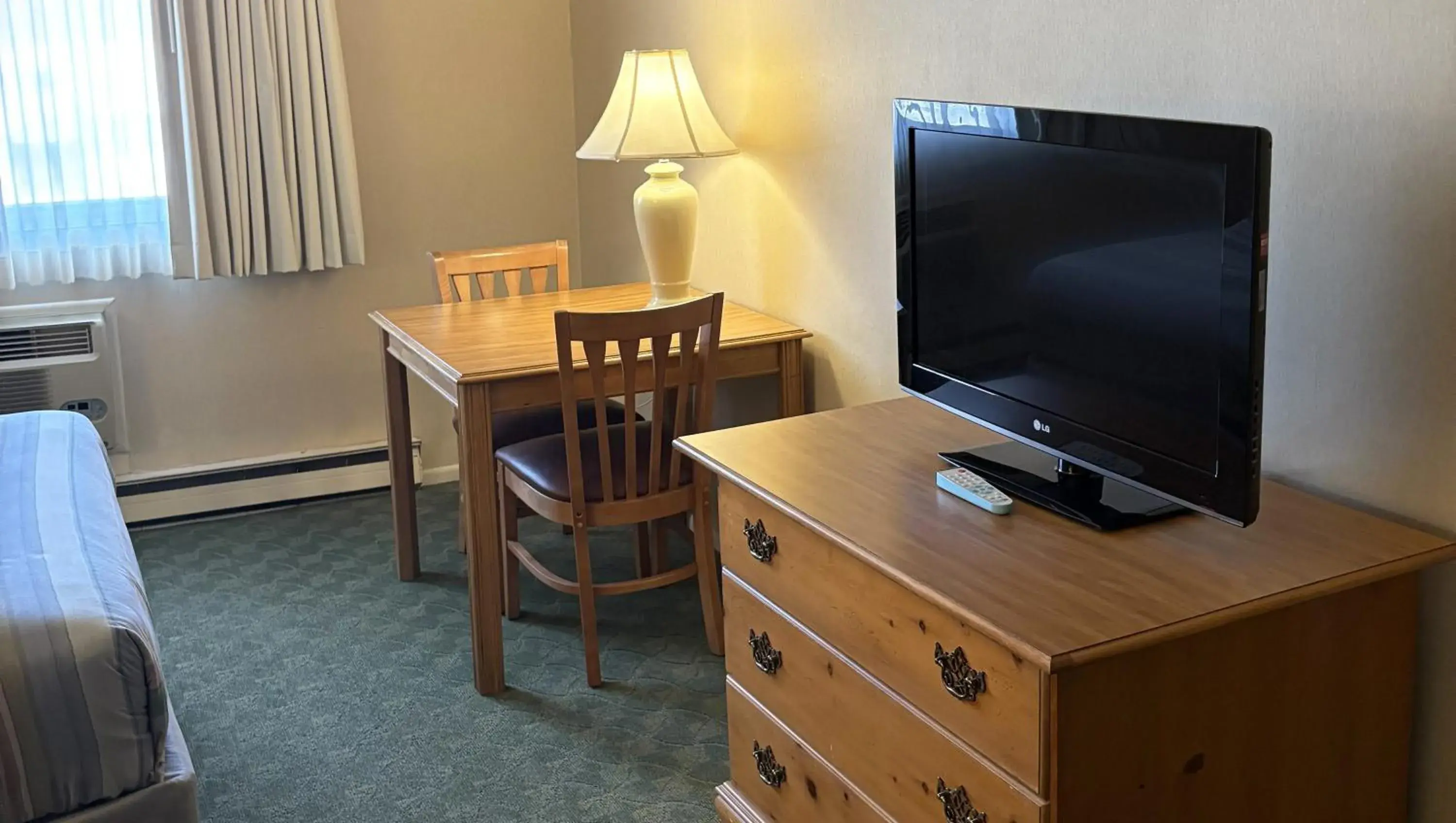 Photo of the whole room in Magnuson Grand Pioneer Inn and Suites Photo of the whole room in Magnuson Grand Pioneer Inn and Suites