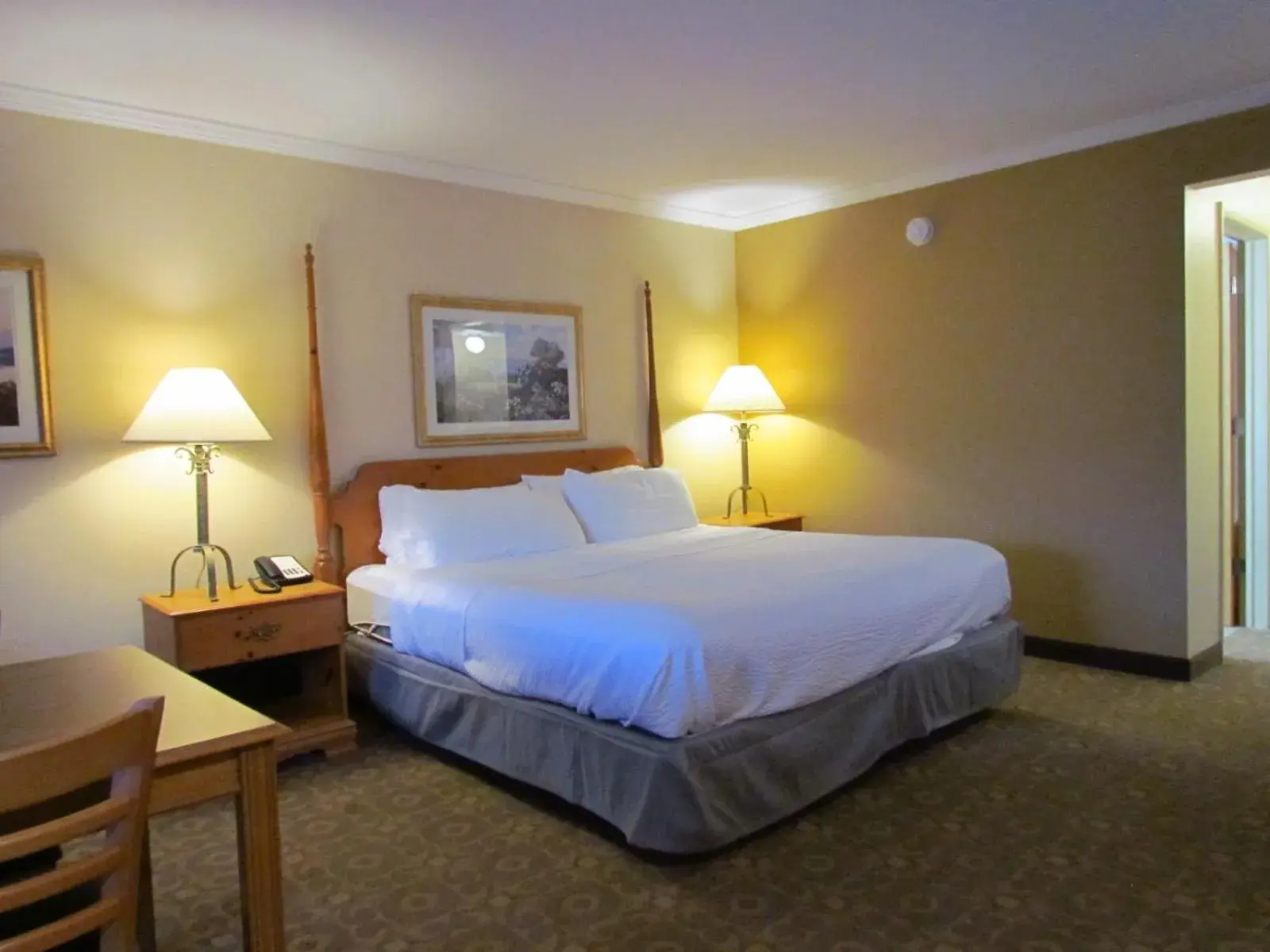 Bedroom, Bed in Magnuson Grand Pioneer Inn and Suites Bedroom, Bed in Magnuson Grand Pioneer Inn and Suites