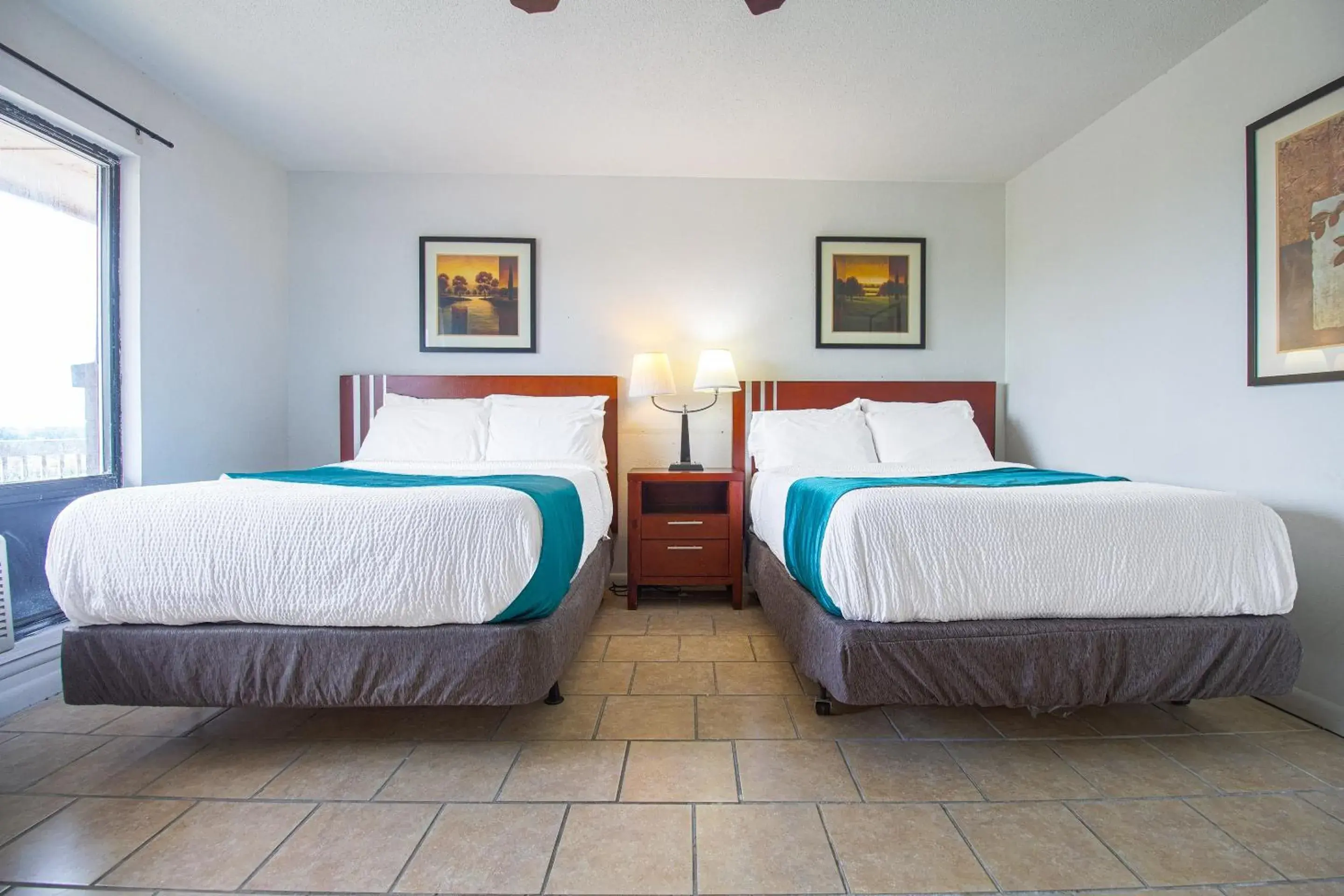 Bedroom in American Best Inn By OYO I-35 Perry near Lake McMurtry Bedroom in American Best Inn By OYO I-35 Perry near Lake McMurtry