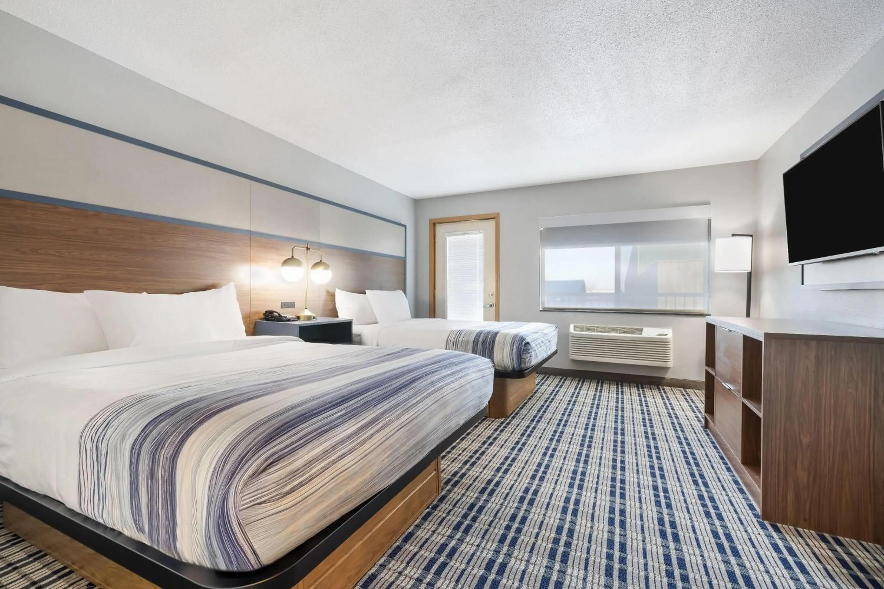 Photo of the whole room, Bed in AmericInn by Wyndham Aberdeen Event Center