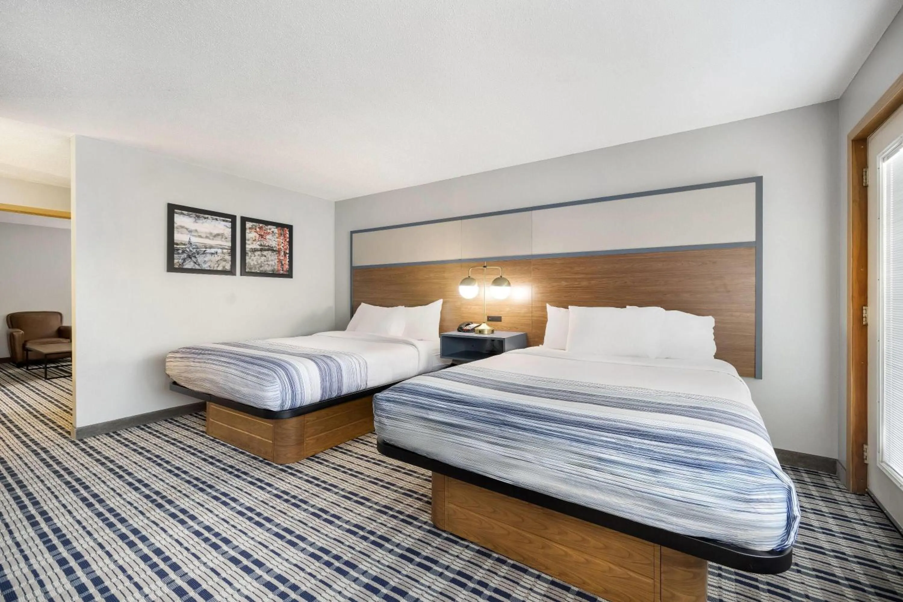 Photo of the whole room, Bed in AmericInn by Wyndham Aberdeen Event Center