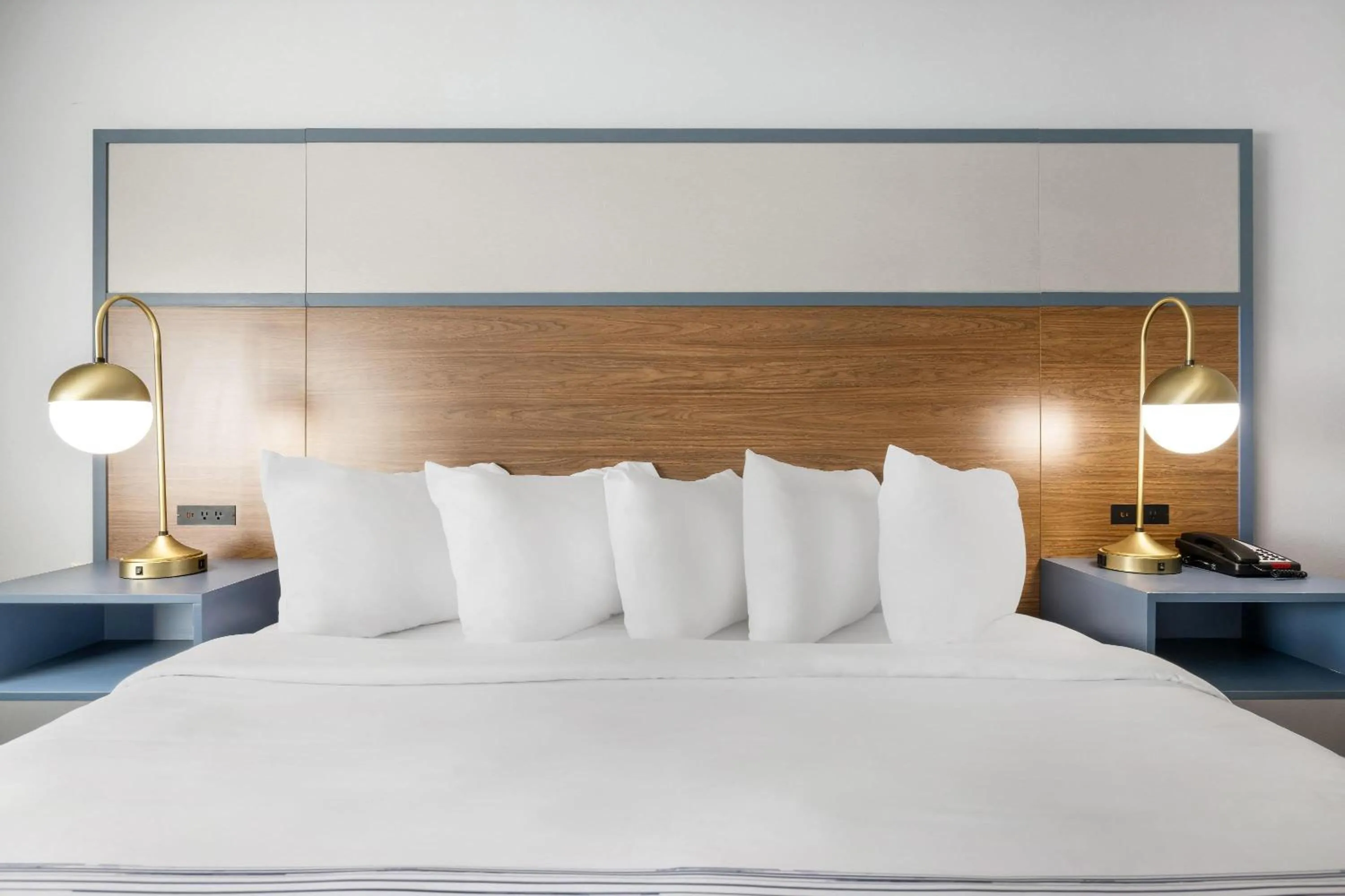 Bed in AmericInn by Wyndham Aberdeen Event Center