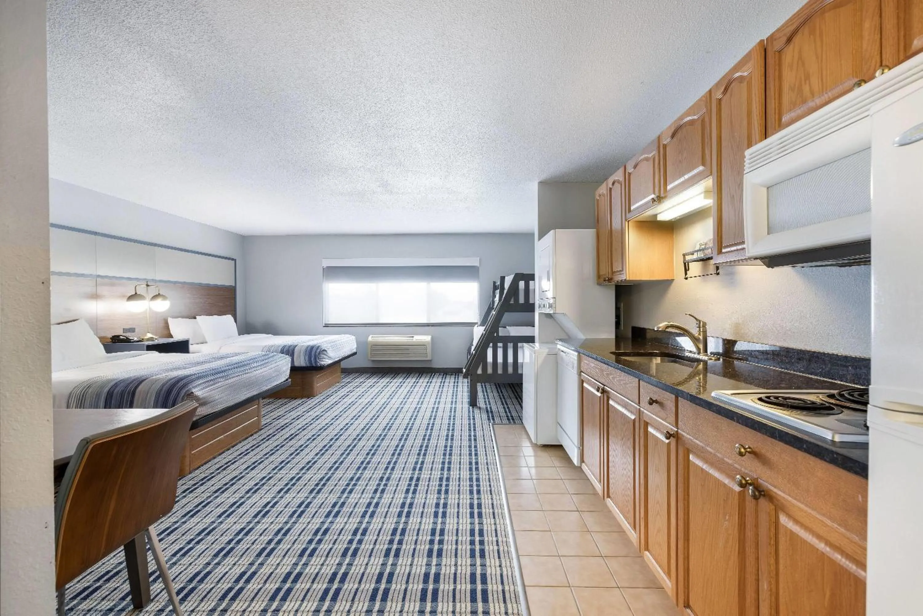 Photo of the whole room, Bed in AmericInn by Wyndham Aberdeen Event Center