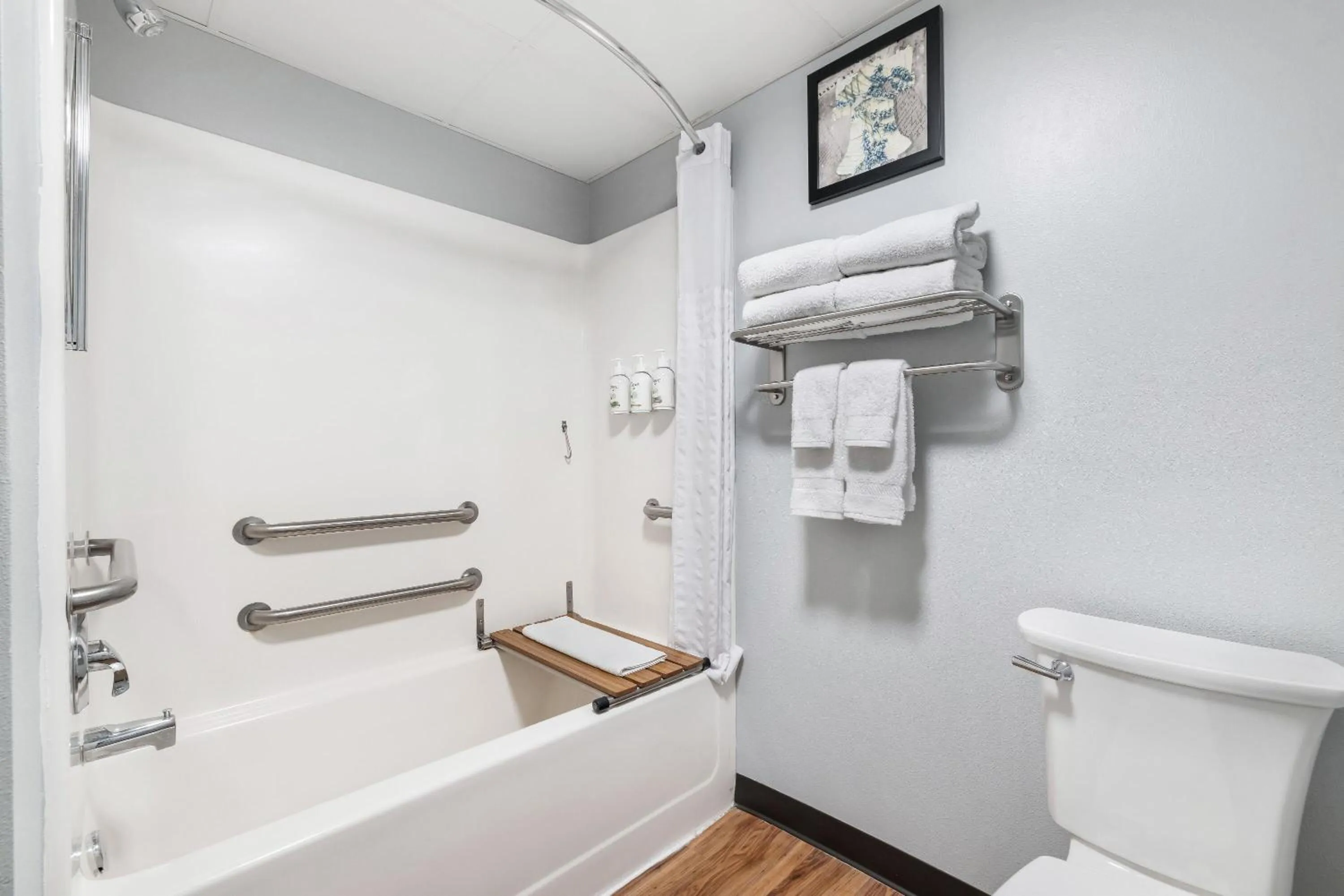 Bathroom in AmericInn by Wyndham Aberdeen Event Center