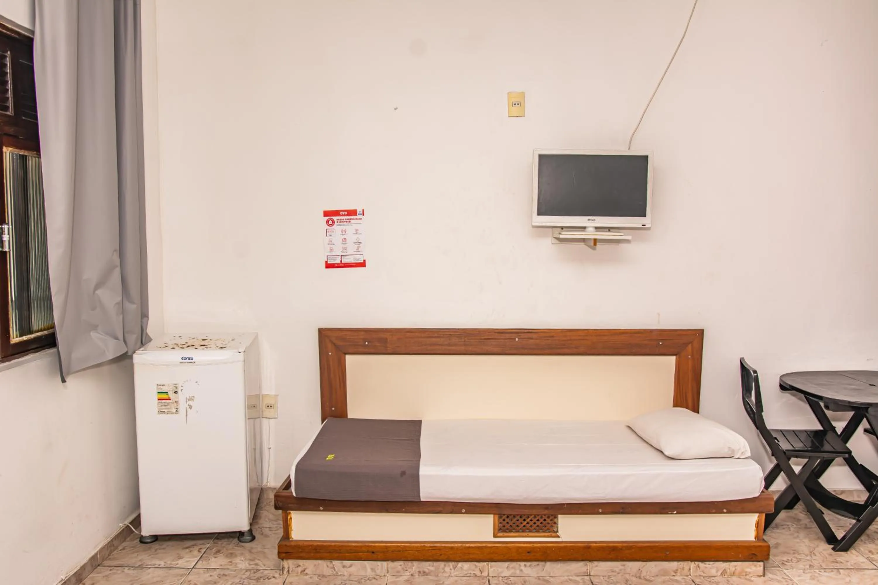 Bed, TV/Entertainment Center in Pousada Pargos