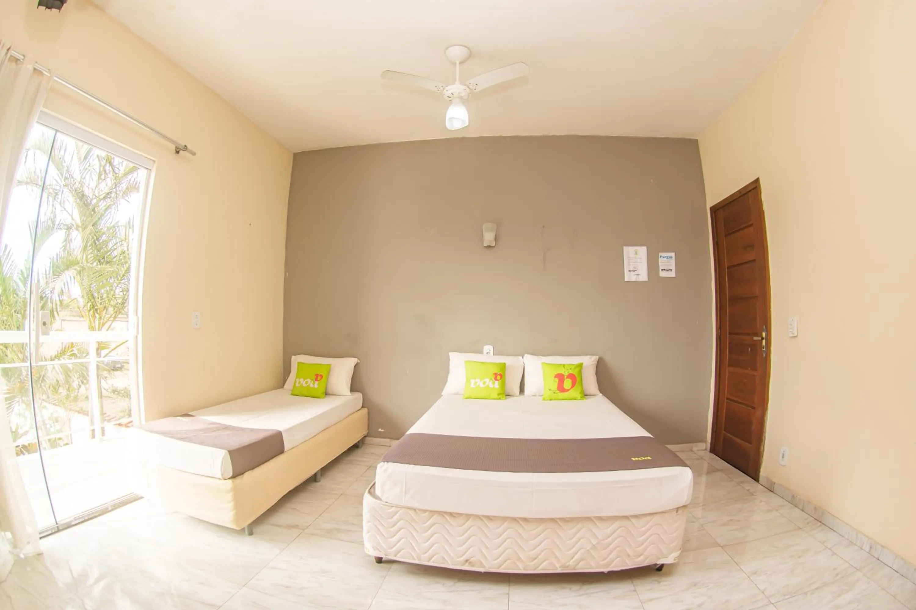 Bed in Pousada Pargos